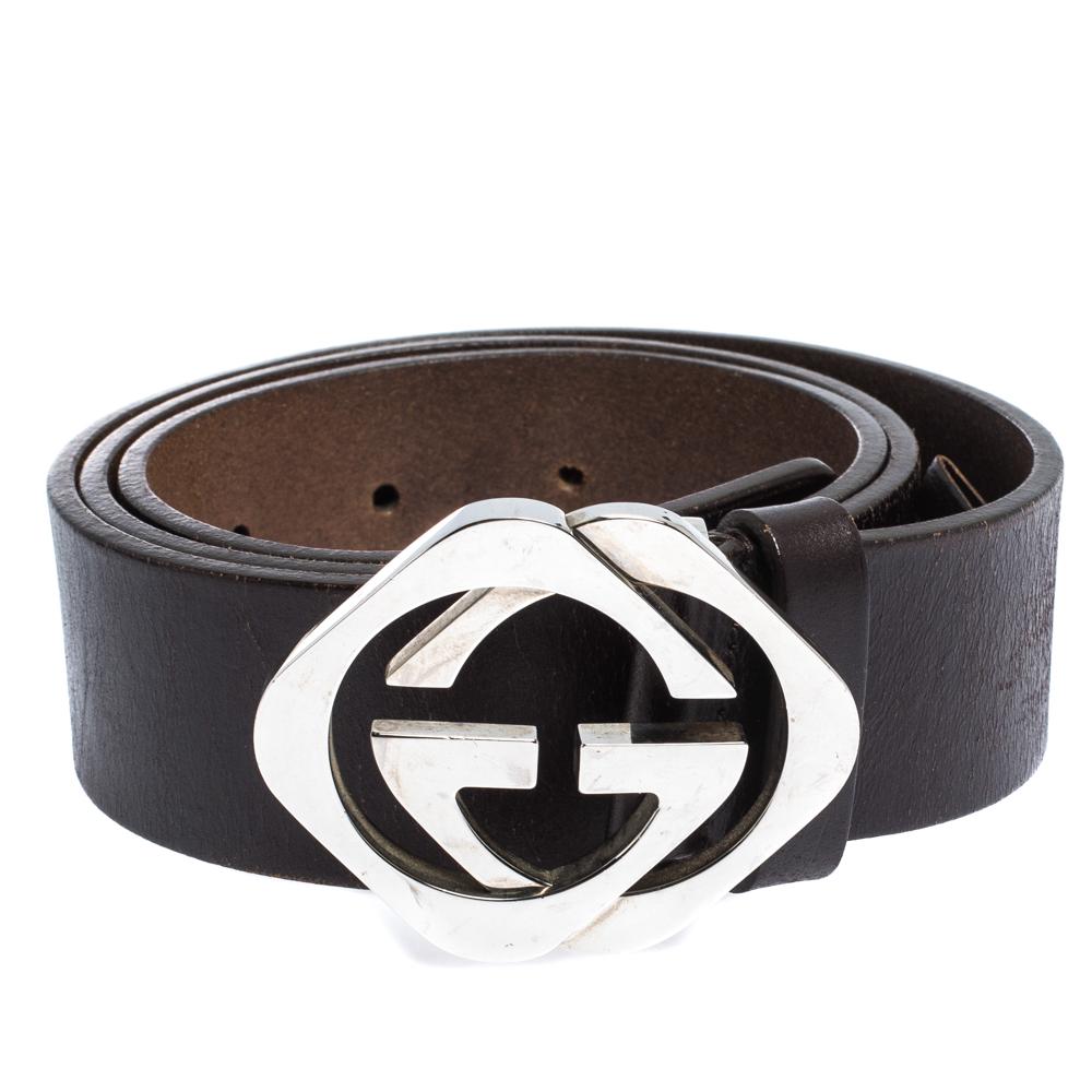 Add a perfect finish to your look with this belt from the fashion label Gucci. It is crafted from leather in dark brown and is accented with a loop and silver-tone square interlocking GG buckle.

Includes:Original Dustbag, Original Box
