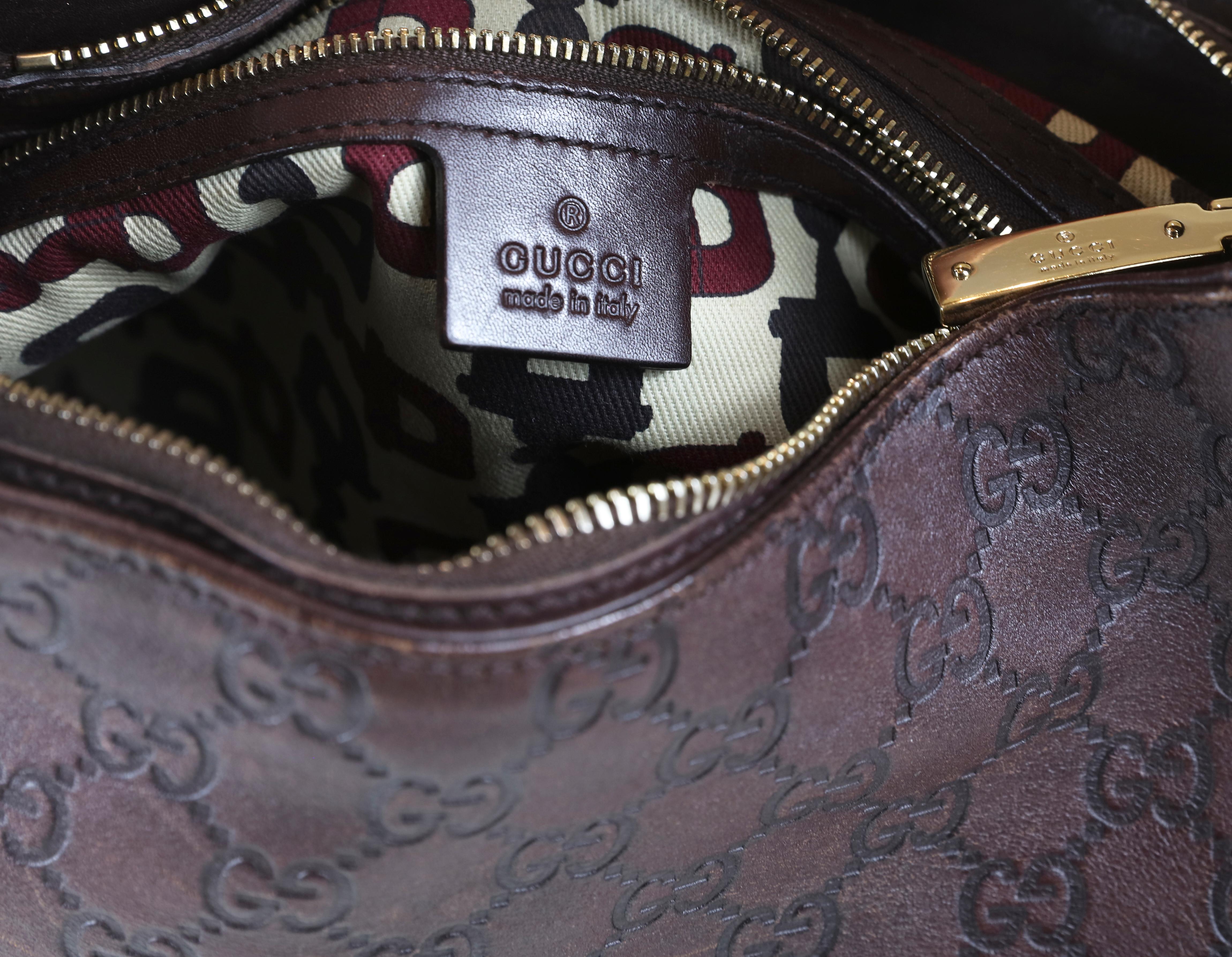  Sac hobo Gucci en cuir marron foncé Guccissima 