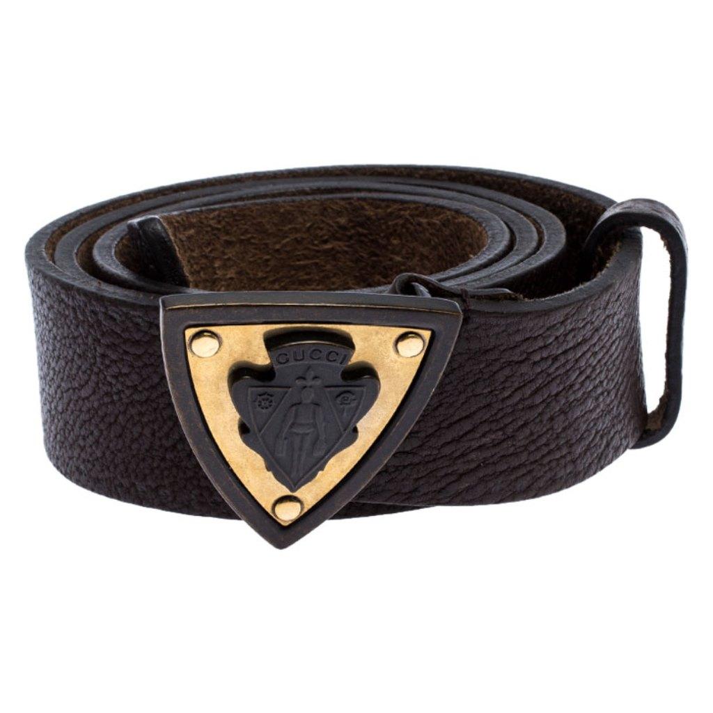 This belt from Gucci will be your new favorite statement accessory. It has a minimalist design rendered in dark brown leather and accented with a Hysteria crest buckle. This belt will complement your versatile fashion choices