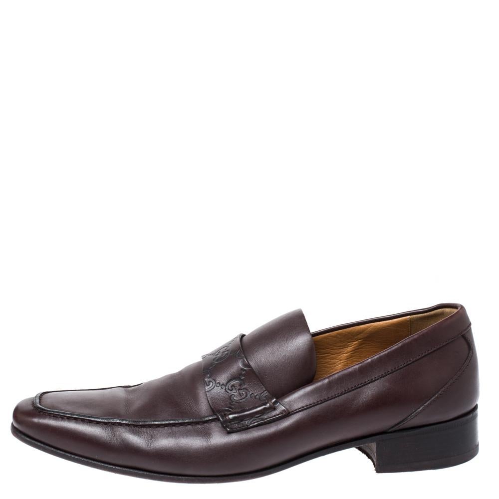 Exquisite and well-made, these Gucci loafers are worth owning. They've been crafted from leather and they come flaunting a dark brown shade with GG-detailed leather accents on the uppers. The loafers are ideal to be worn all day.

Includes: The