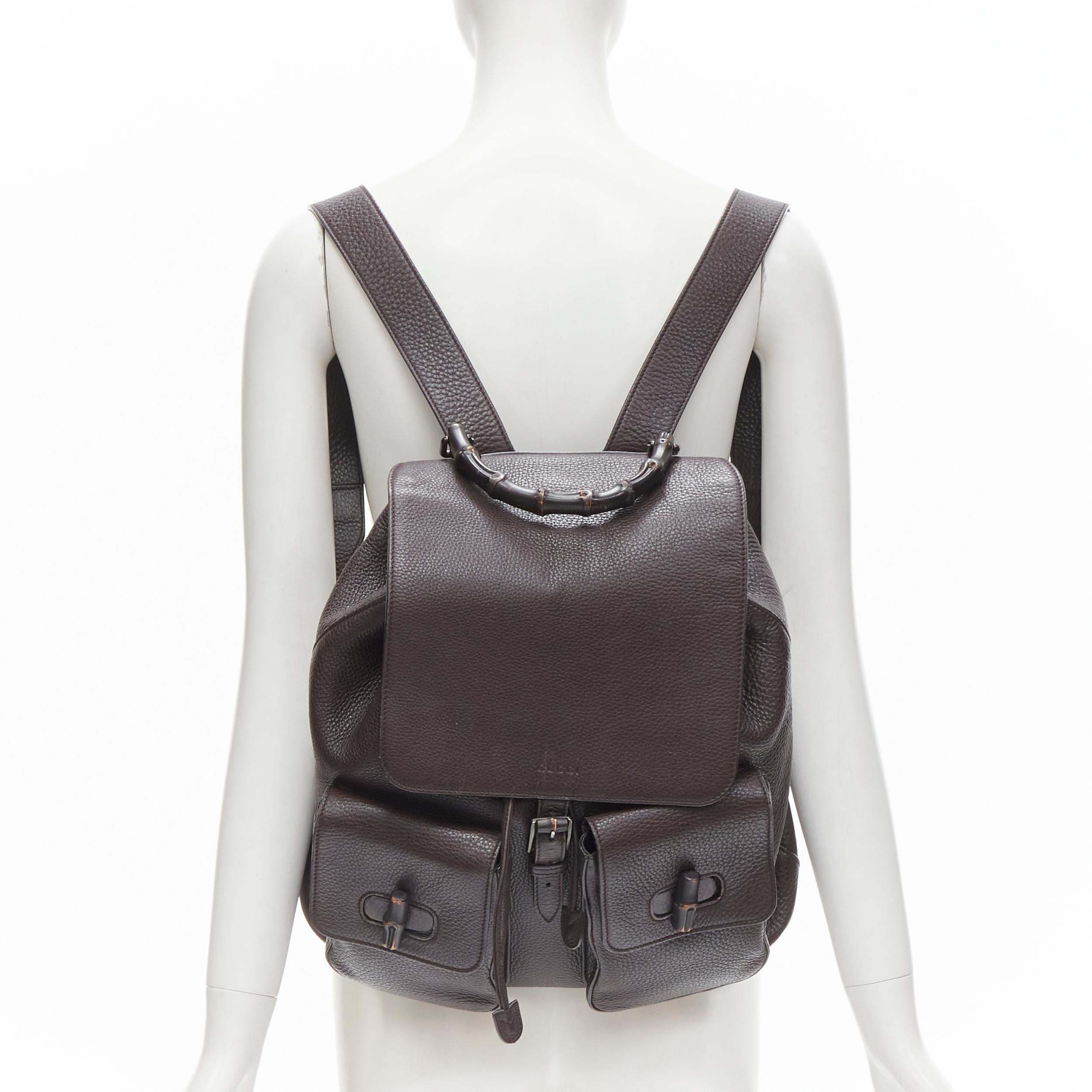 GUCCI dark brown pebble leather Bamboo turnlock pocket flap backpack bag 
Reference: JACG/A00006 
Brand: Gucci 
Model: 387097 001998 
Collection: Bamboo 
Material: Leather 
Color: Brown 
Pattern: Solid 
Closure: Turnlock 
Extra Detail: Dark brown