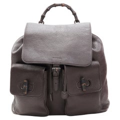 Vintage GUCCI dark brown pebble leather Bamboo turnlock pocket flap backpack bag