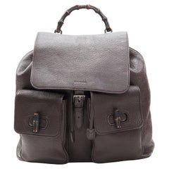 GUCCI dark brown pebble leather Bamboo turnlock pocket flap backpack bag