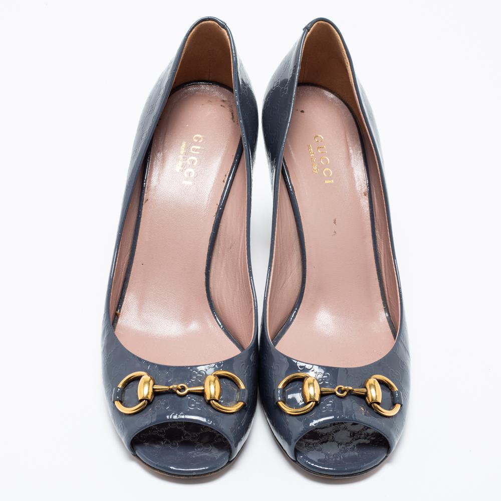 Perfect for all seasons, this pair of Gucci pumps are just what you need. Crafted out of Guccissima patent leather, these pumps are a charming add-on accessory that you absolutely need to own. Set the mood for the evening by wearing this gorgeous