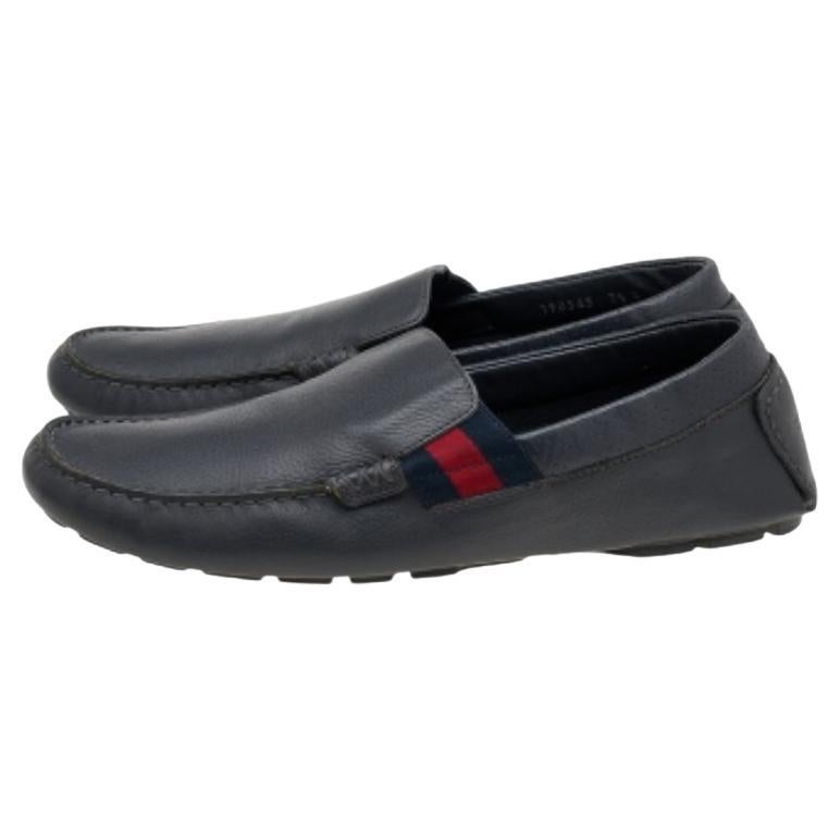 These Gucci loafers are a great pick for when you want something stylish yet comfortable. Covered in leather, they are highlighted with the signature Web stripe. The brand signature at the counters adds to the pair's charm.