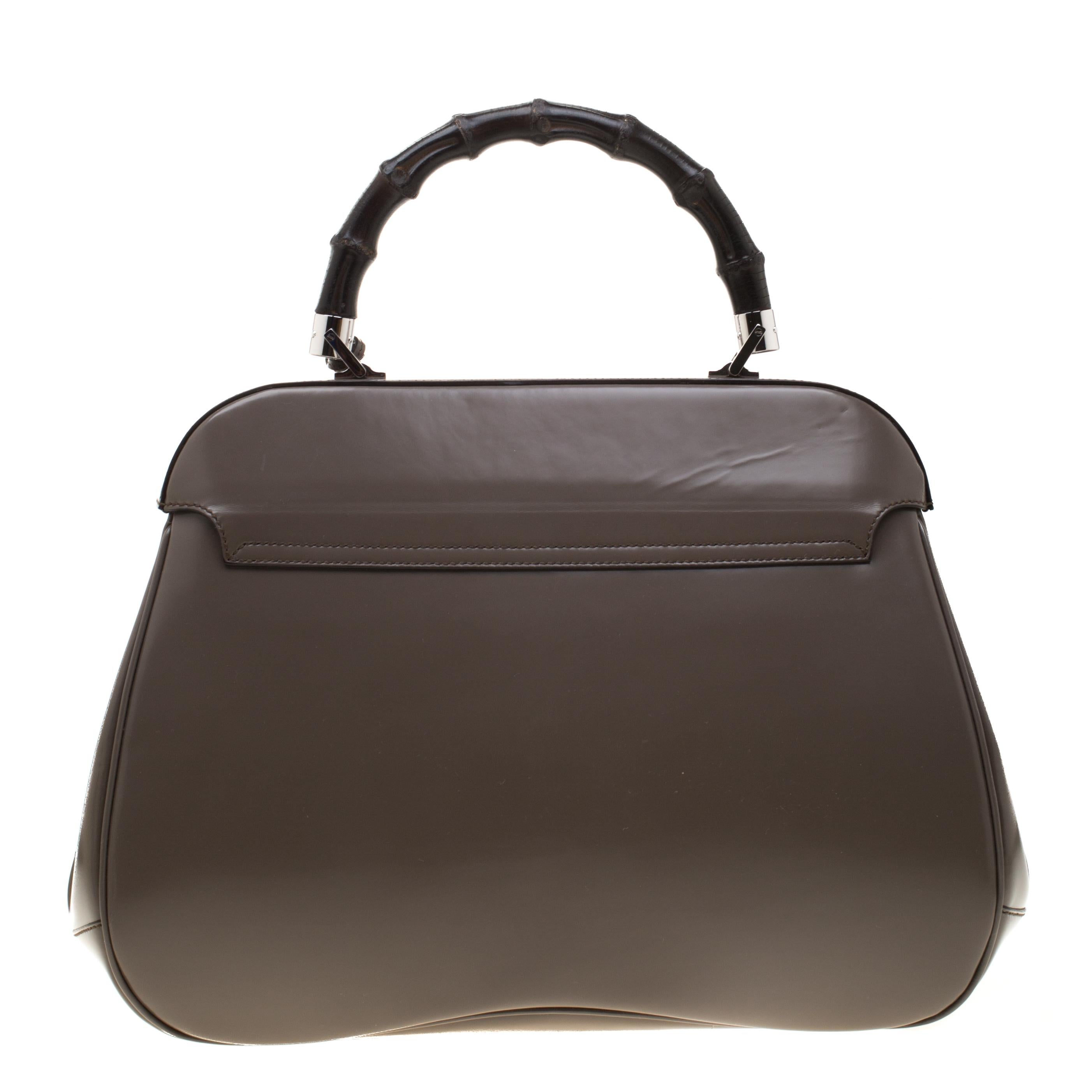 Handbags as fabulous as this one are hard to come by. Crafted from leather, this stunning number features the signature Lady lock and a leather key holder. The spacious suede interior houses a zipped compartment that will safely hold your