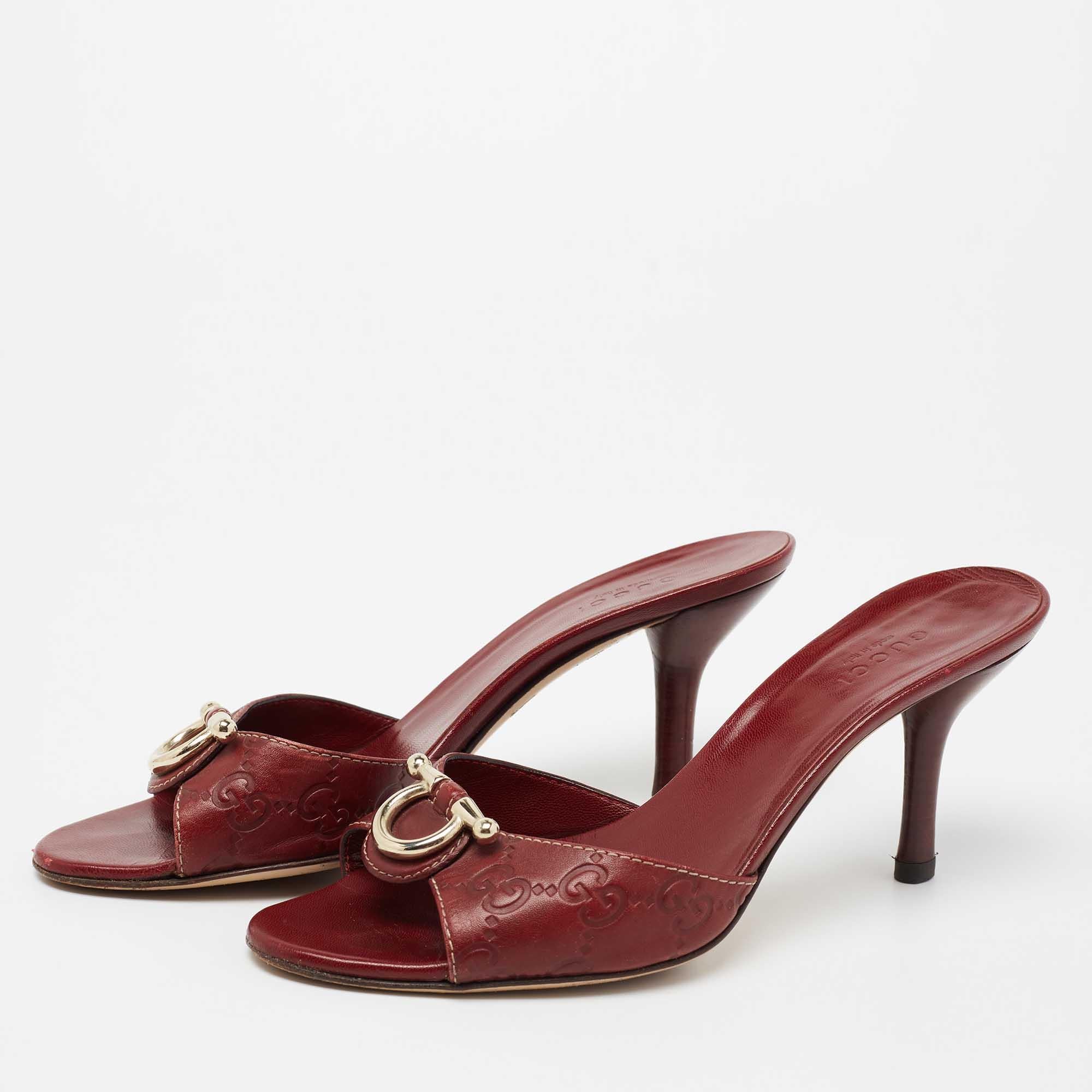 Traditional elements get a contemporary update with the design of these Gucci sandals. Detailed with Guccisima leather, the front strap is adorned with a Horsebit motif, and it is easy to slide into this open-toe silhouette.

Includes: Original