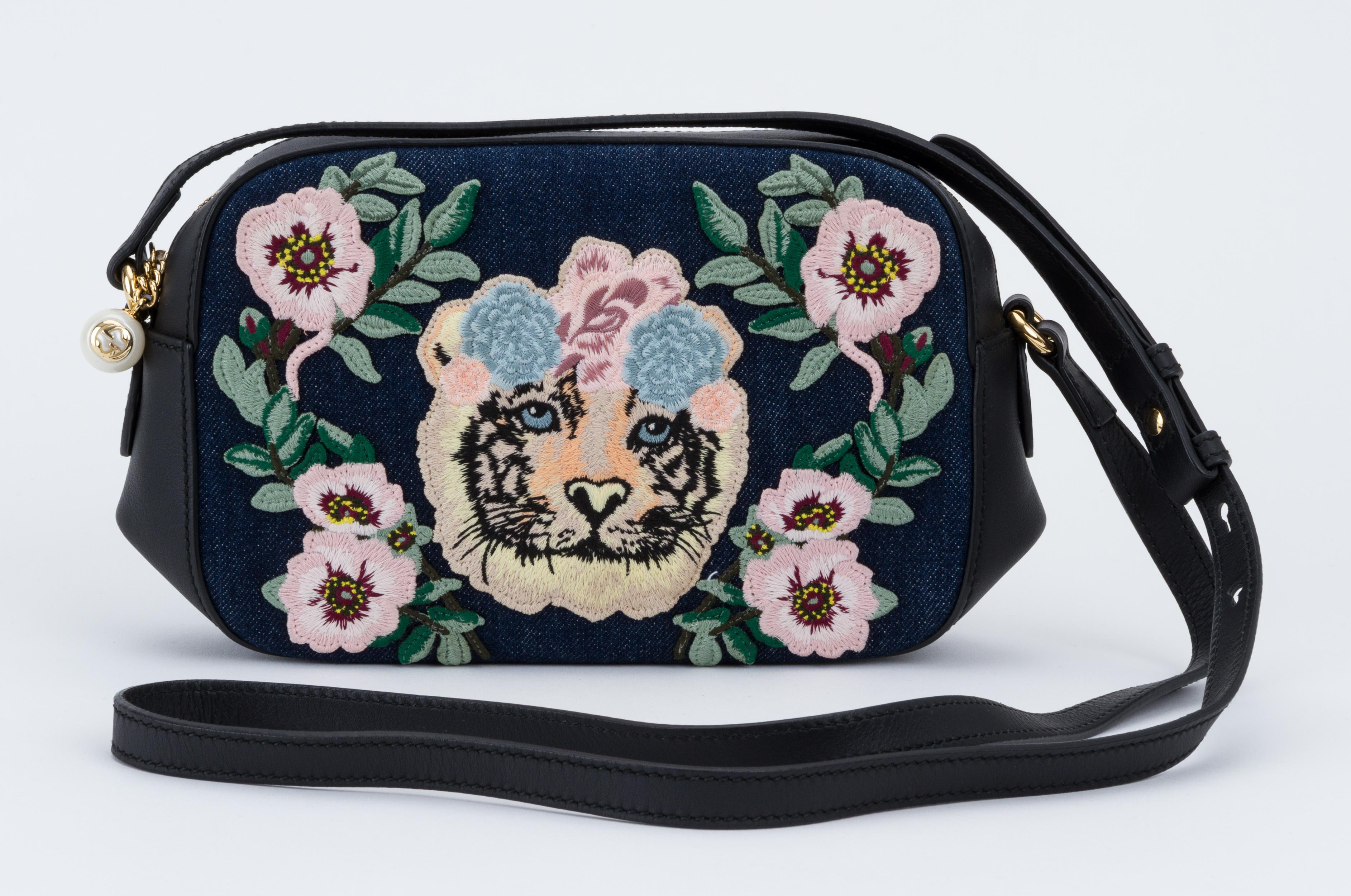 Gucci Japan exclusive collection, black leather and denim cross body. Embroidered tiger and flowers. Shoulder drop 23