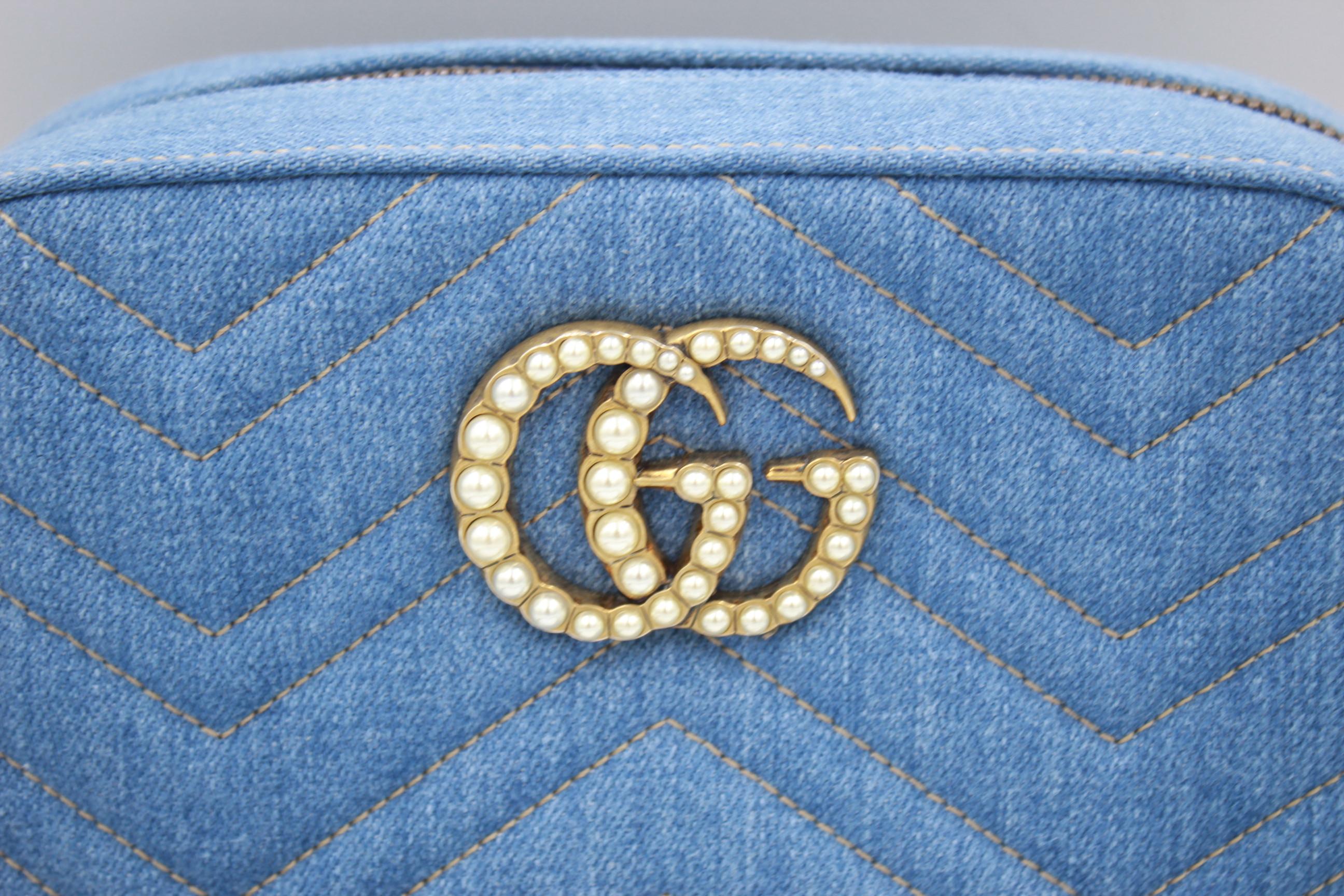 Gucci denim crossbody camera bag with Marmont logo. really good condition almost no sign of wear. Sold with dust bag. Size 25x14