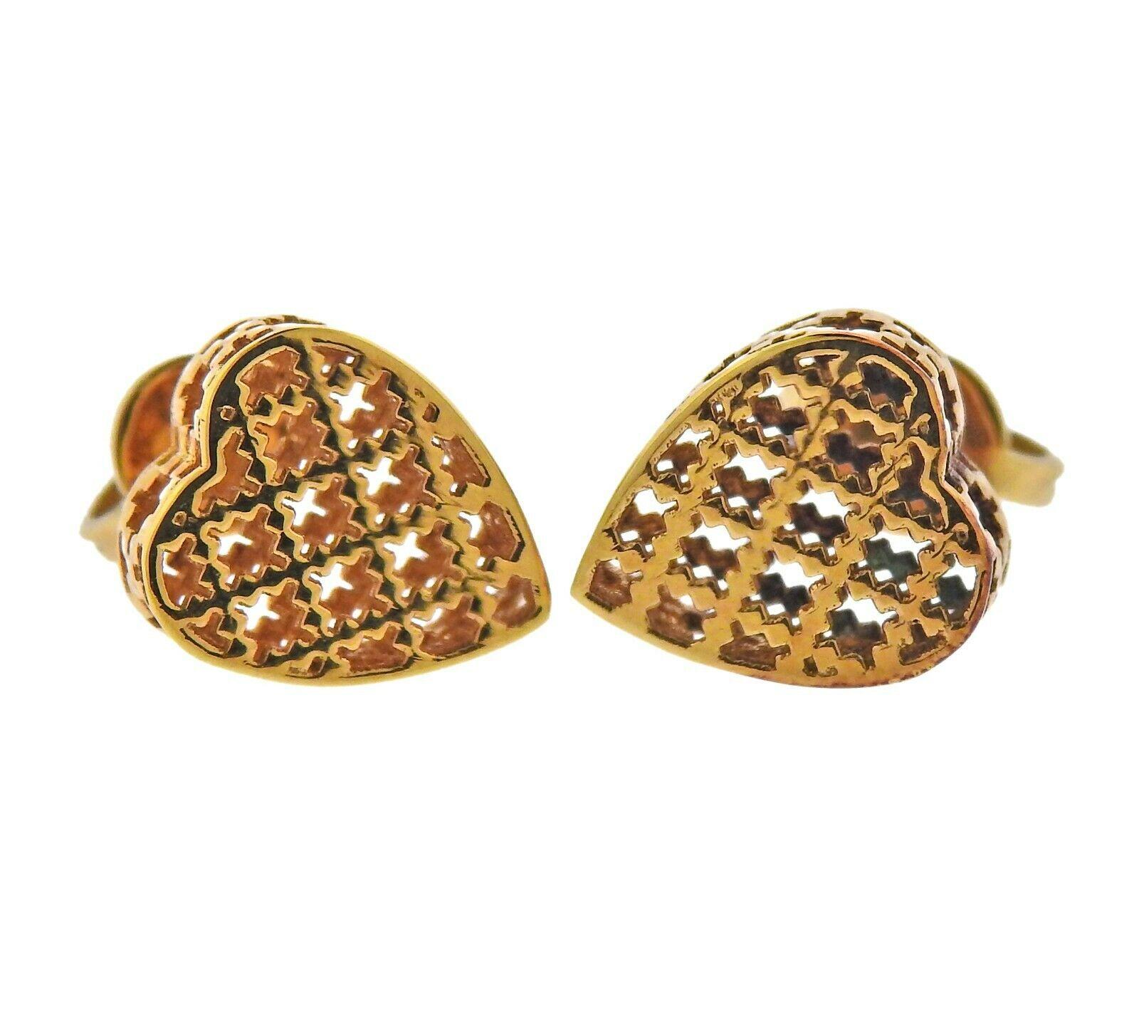 Pair of 18k yellow gold new Gucci Diamantissima heart earrings. Approx. retail $1690. Weight - 2.5 grams. Marked:  Gucci, Italian mark, Au750. Earrings are 10mm x 8.7mm.