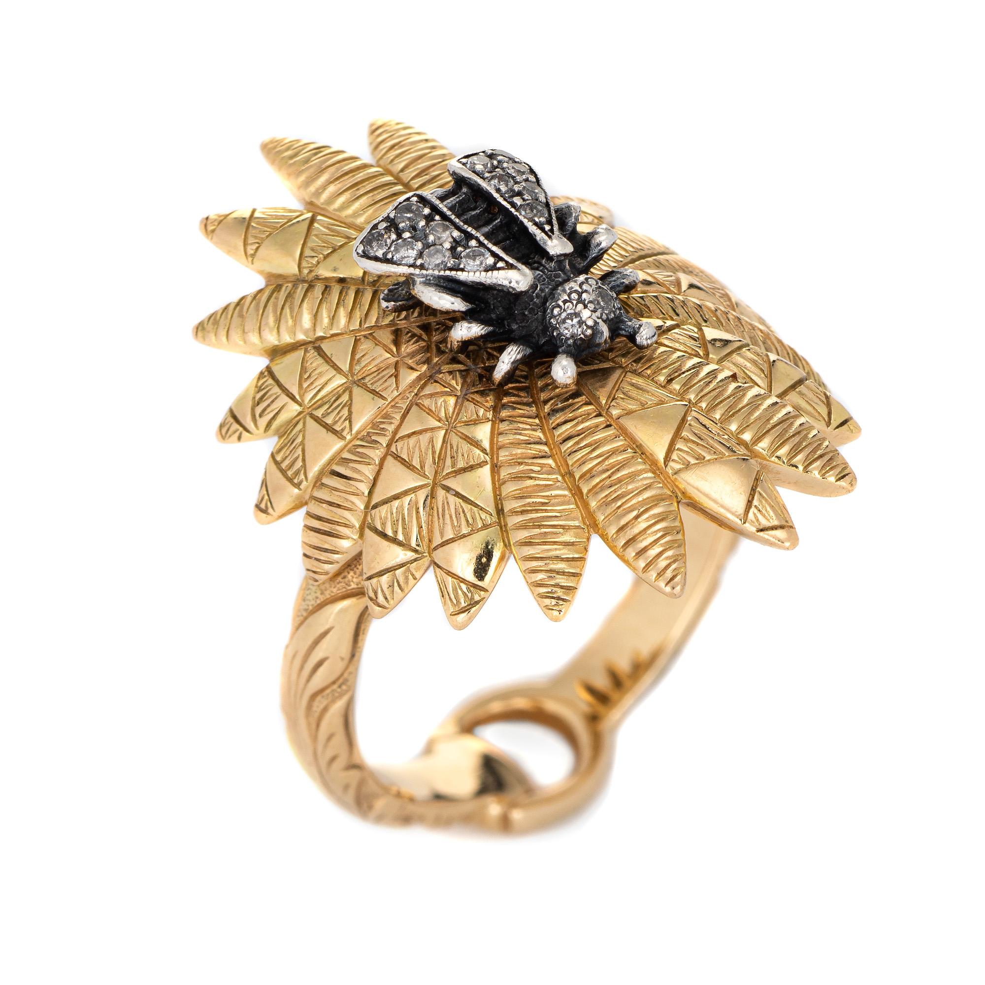 Stylish pre-owned Gucci diamond bee ring crafted in 18 karat yellow gold and sterling silver. 

Diamonds total an estimated 0.07 carats (estimated at H-I color and SI2-I1 clarity). 

The petite bee sits upon a textured mount, slightly curved in a