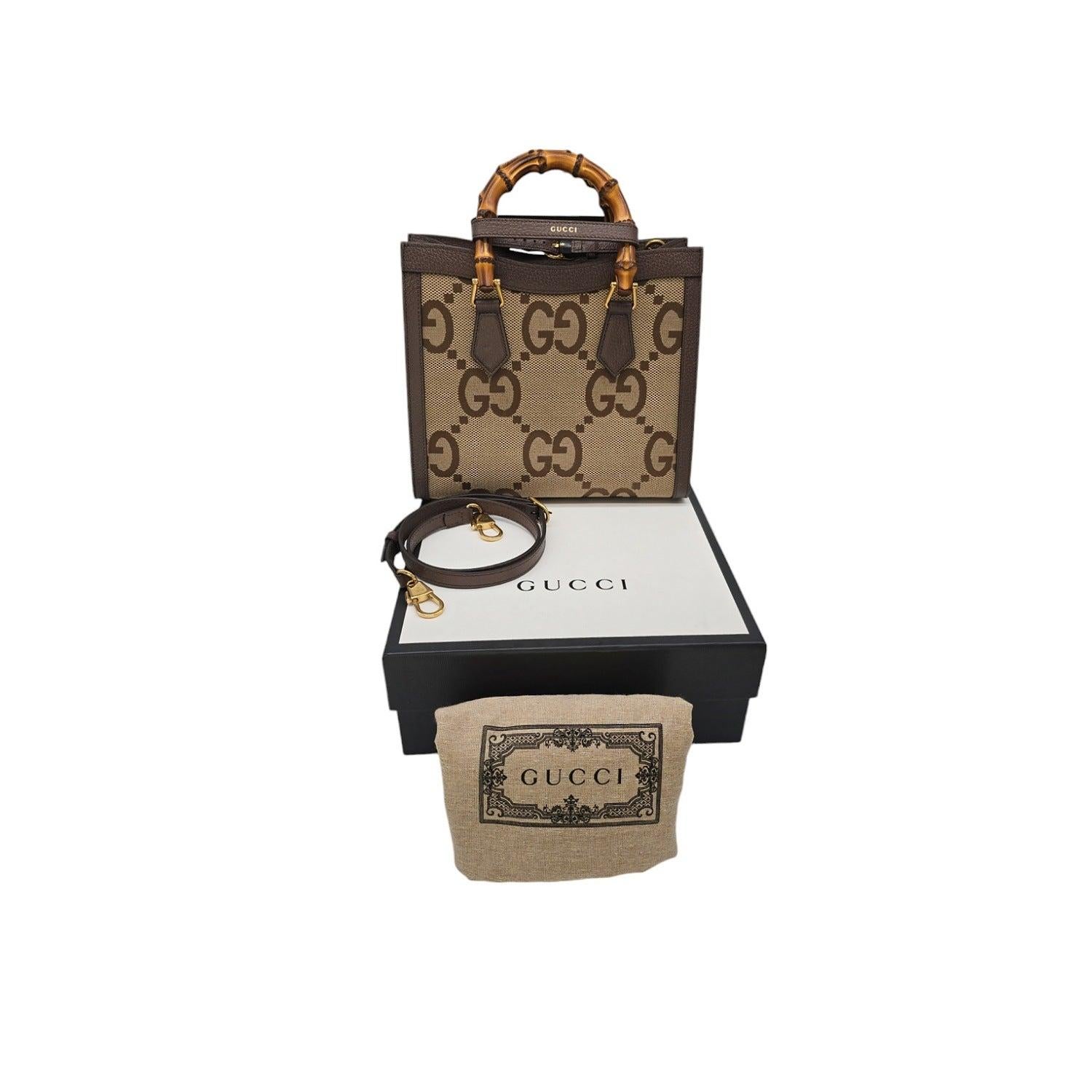 Elevate your style with the Gucci Diana Jumbo GG Small Tote Bag. Made in Italy with Jumbo GG Canvas and bamboo top handles, this bag exudes luxury. The magnetic closure opens up to a leather lined interior with a small slip pocket, making it both