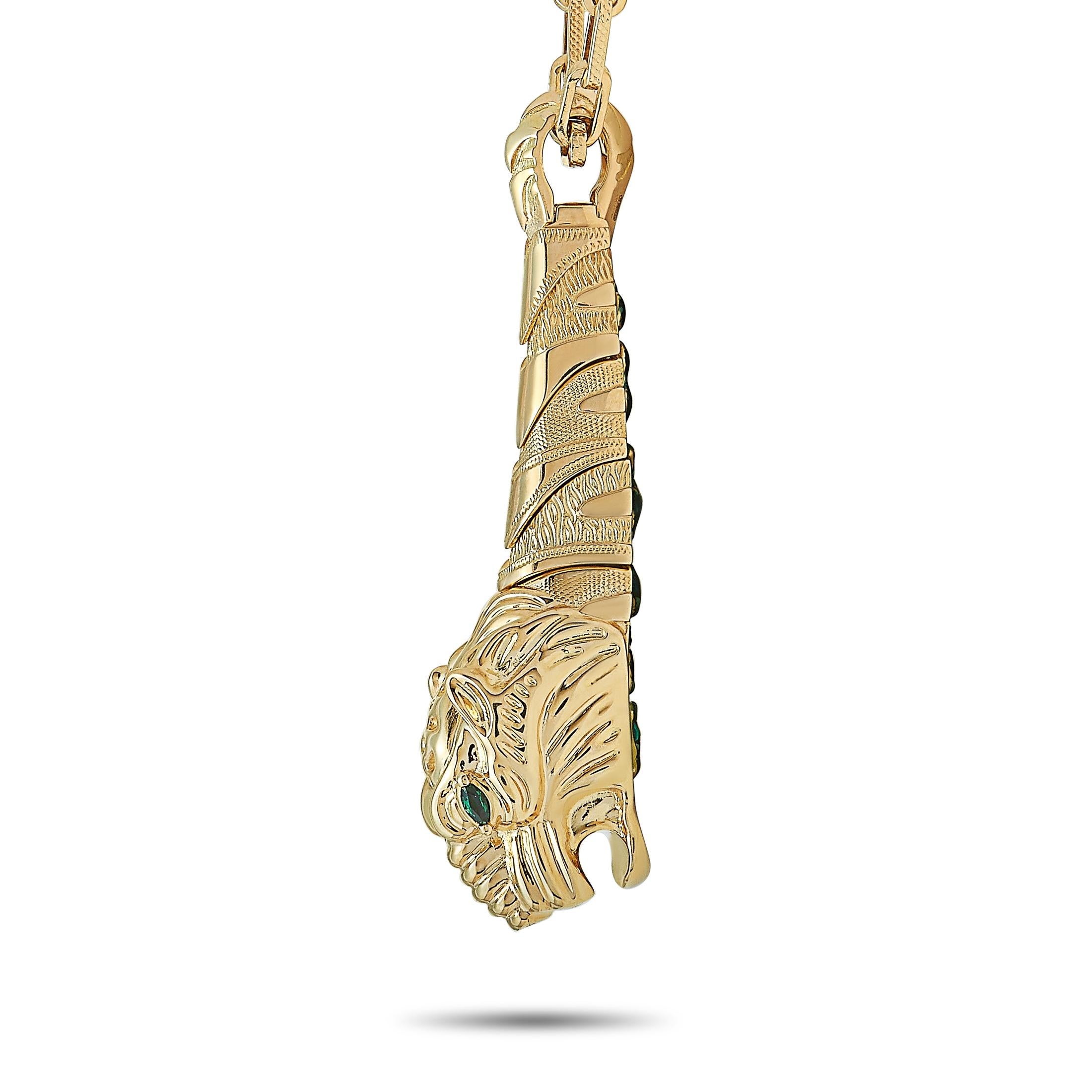 The Gucci “Dionysus” necklace is made of 18K yellow gold and weighs 2.5 grams. The necklace boasts a 26” chain and a pendant that measures 2.50” in length and 0.50” in width.
 
 This jewelry piece is offered in brand new condition and includes the