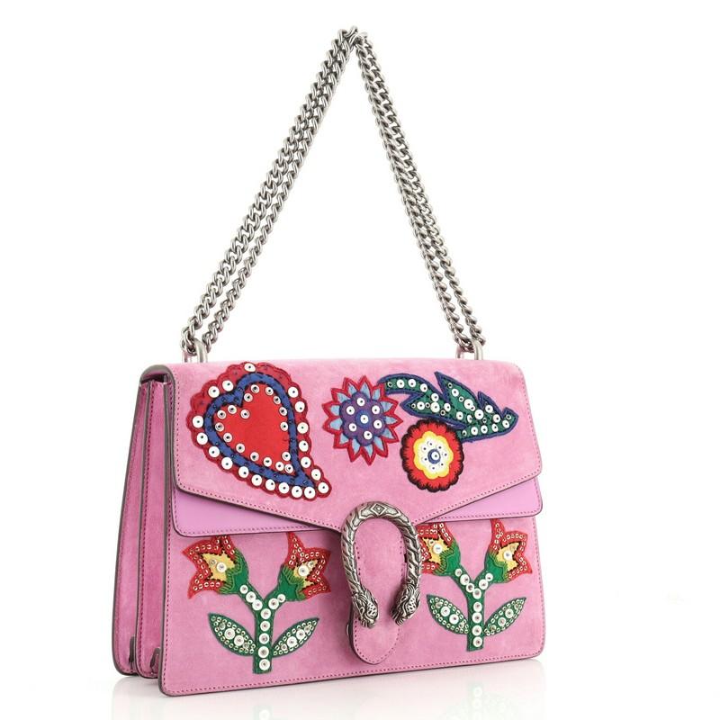 This Gucci Dionysus Bag Embellished Suede Medium, crafted from purple embellished suede, features chain link strap, textured tiger head spur detail on its flap, exterior back slip pocket and aged silver-tone hardware. Its hidden push-pin closure