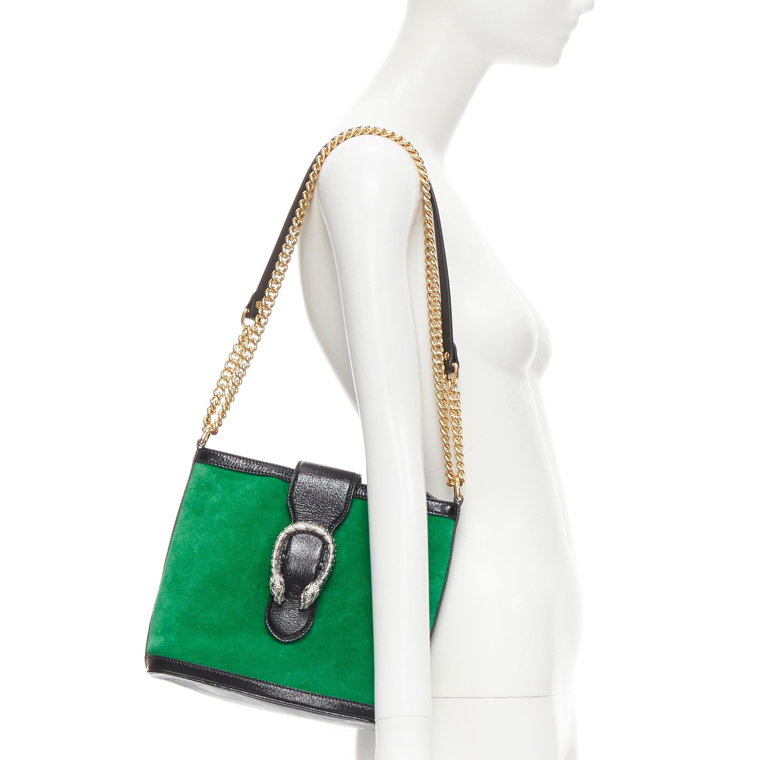 GUCCI Dionysus Kelly green suede black patent trimmed crossbody bucket bag 
Reference: MELK/A00186 
Brand: Gucci 
Designer: Alessandro Michele 
Model: 499622 525040 
Material: Suede 
Color: Green 
Pattern: Solid 
Closure: Magnetic 
Extra Detail: