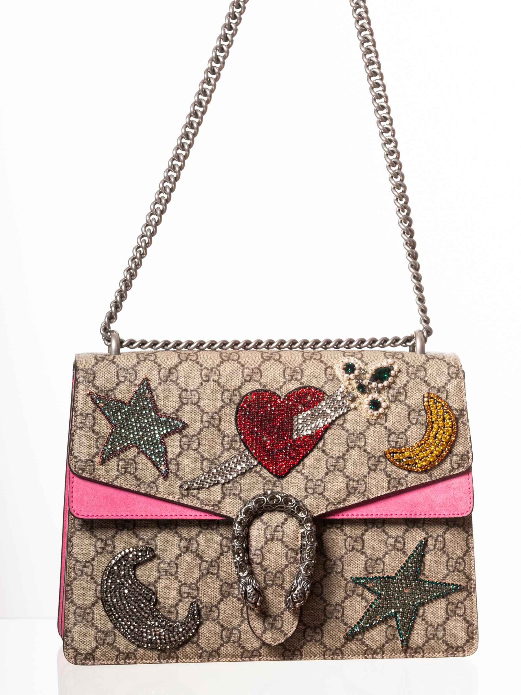 This authentic Gucci Dionysus Handbag is named after the Greek God & created by famed designer Alessandro Michele in his Spring/Summer 2016 Collection. Crafted from taupe GG coated canvas with stand-out sequin embellishments, this avant-garde