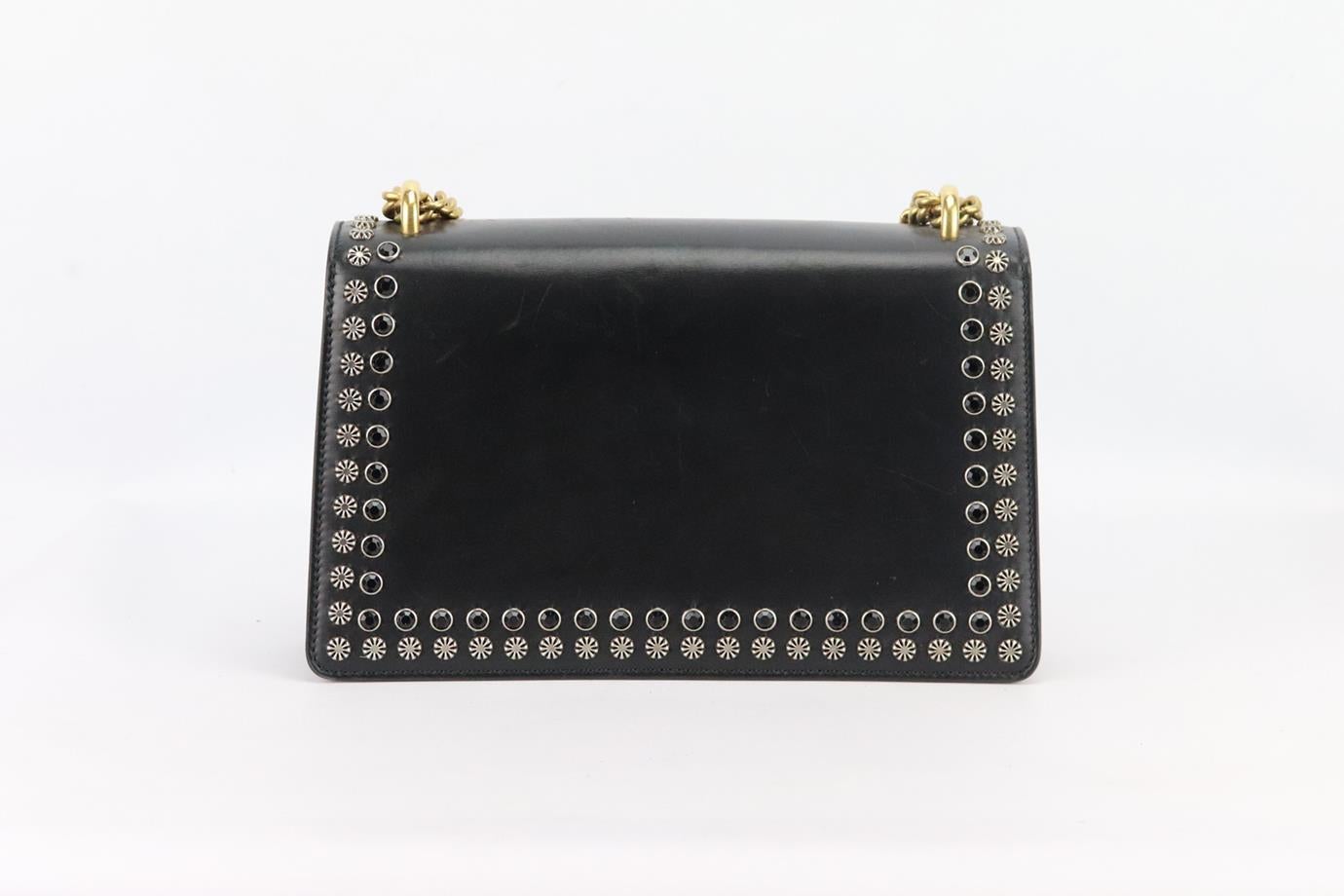 Gucci Dionysus Small studded leather shoulder bag. Made from black leather with silver-tone and black studded detail on the front and back, it has two large compartments with one internal zip compartment. Black. Push fastening at front. Does not