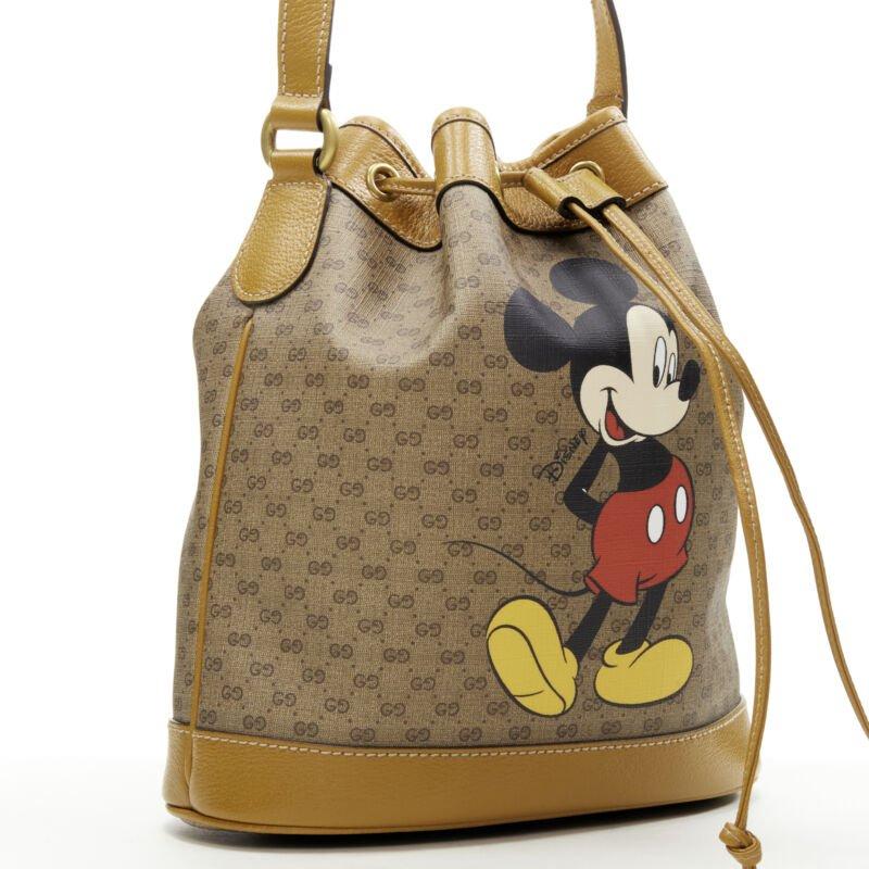 Brown GUCCI DISNEY Candy GG Micky Mouse brown leather trim bucket bag For Sale
