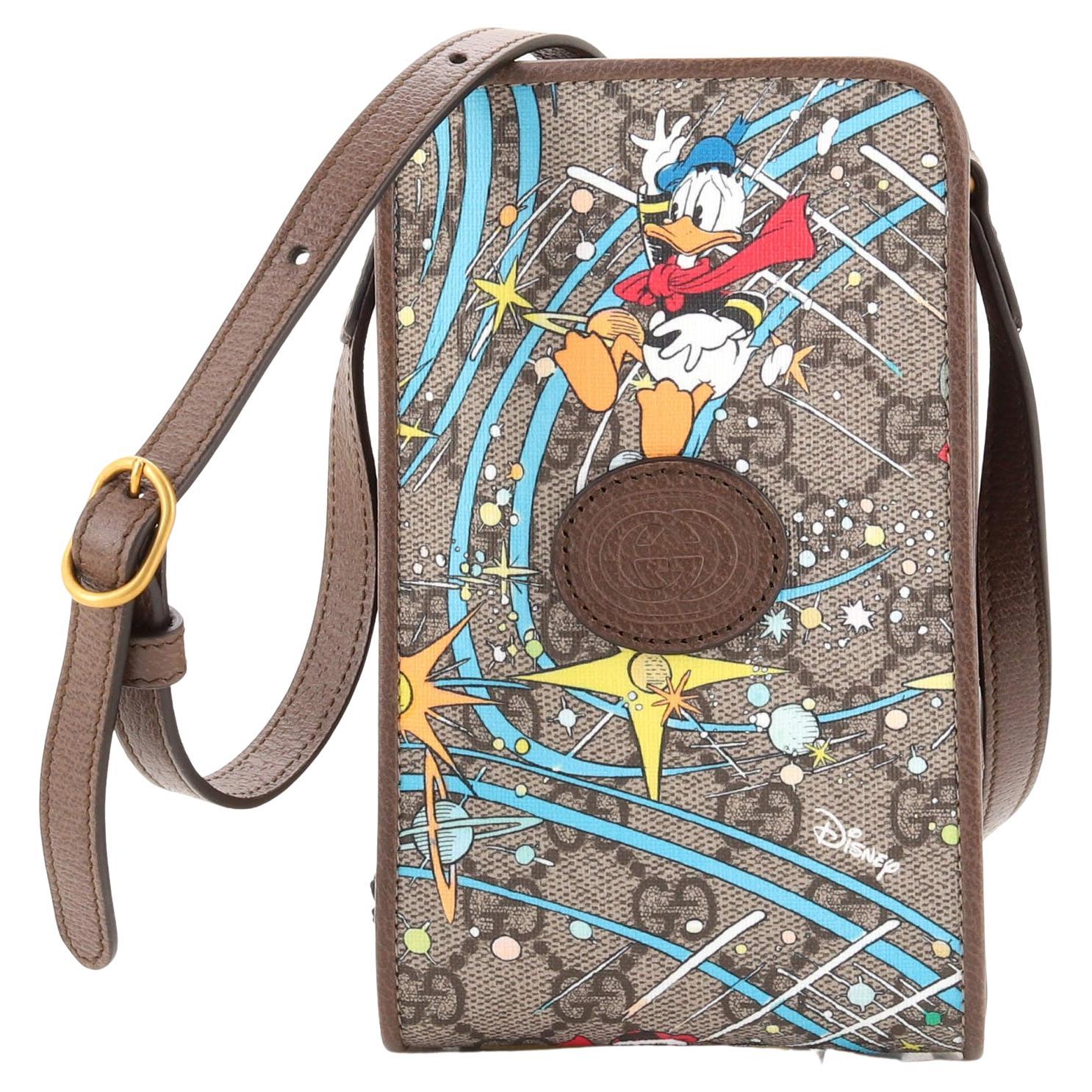 Gucci Disney Donald Duck Phone Case Crossbody Bag Printed GG Coated Canvas  For Sale at 1stDibs | gucci crossbody phone case, disney gucci crossbody,  donald duck crossbody bag