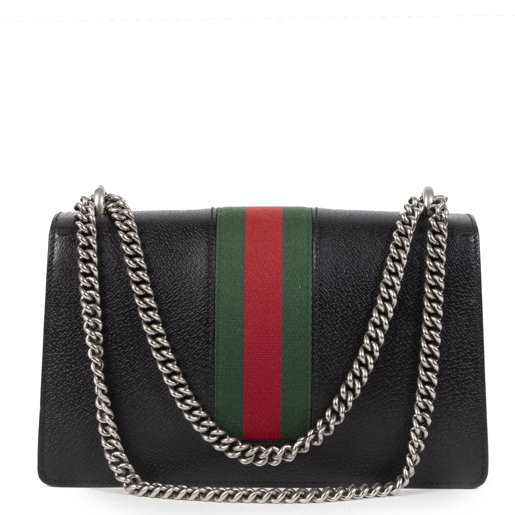 Excellent condition

Gucci Dyonisus Web Black Shoulder Bag

Looking for the perfect everyday bag with a twist? You've found it in this Guccy Dyonisus Web shoulder bag. Its grainy and structured black leather is the perfect basis, the iconic Web