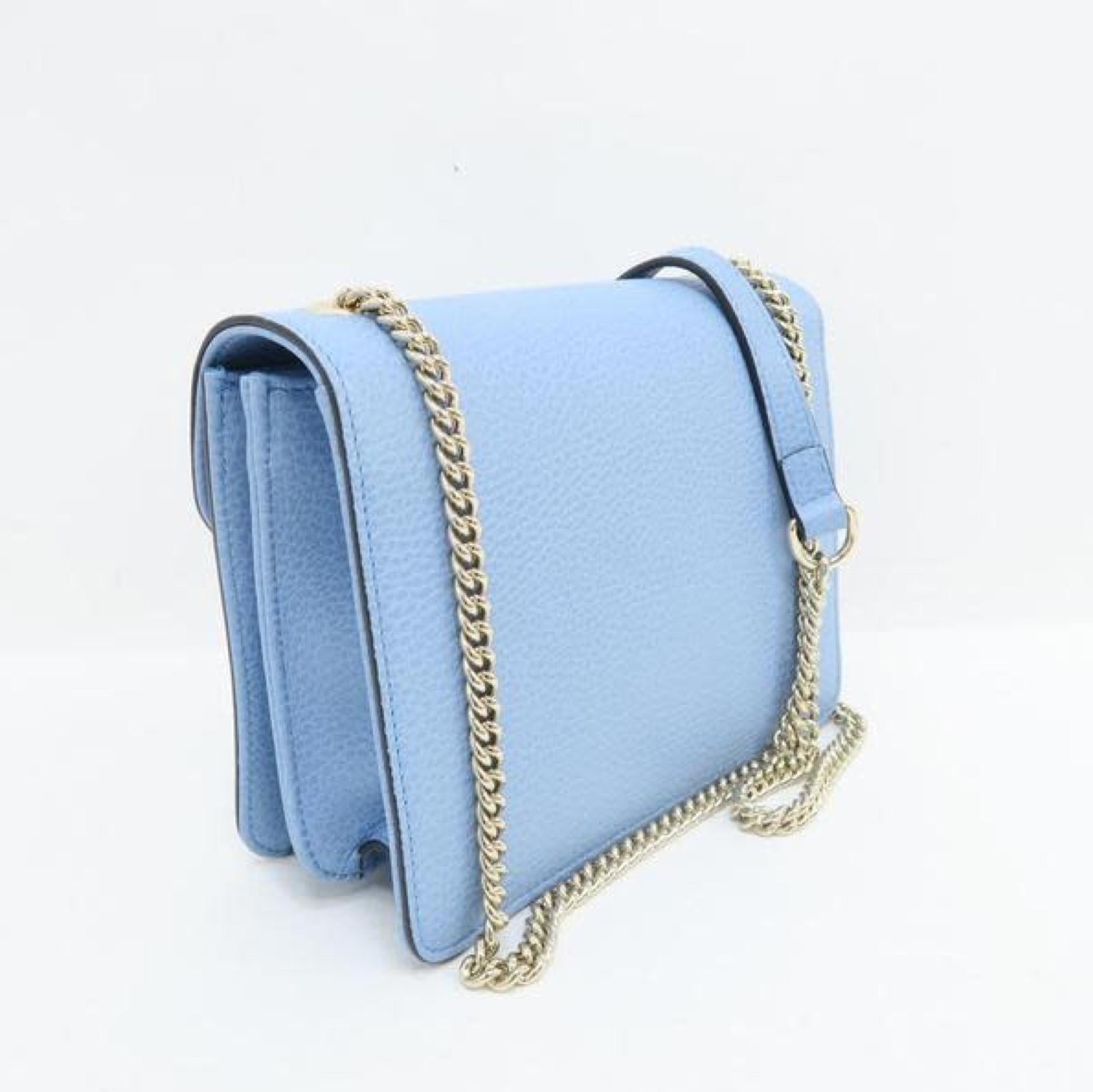 This shoulder bag features a leather body, a chain-link shoulder strap with leather shoulder guard and a front flap with gold-tone interlocking GG flip-lock closure.

COLOR: Baby blue
MATERIAL: Leather
ITEM CODE: 510304 G6268L
MEASURES: H 5.75