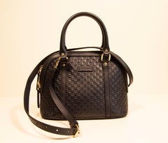 Gucci Dome Crossbody Bag Top Handle Bag in Navy Blue GG Embossed Leather