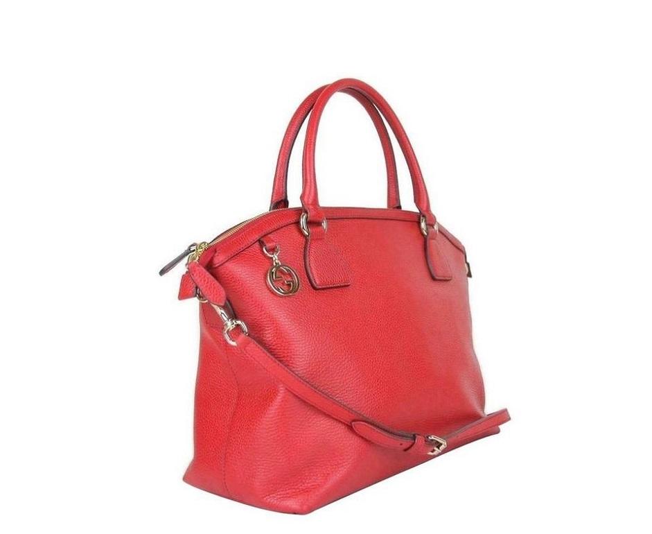 Made of Leather, Double zipper top closure, Detachable shoulder strap, Interlocking G Charm; Light Gold Hardware, One Interior zip pocket, Interlocking G Charm; handle drop 5.5 inches; Measurements: 17 L (across top)/14.5 L (across base) x 11.5 H x