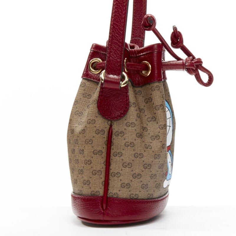 GUCCI DORAEMON 2021 Limited GG Supreme red drawstring crossbody bucket bag In Excellent Condition In Hong Kong, NT