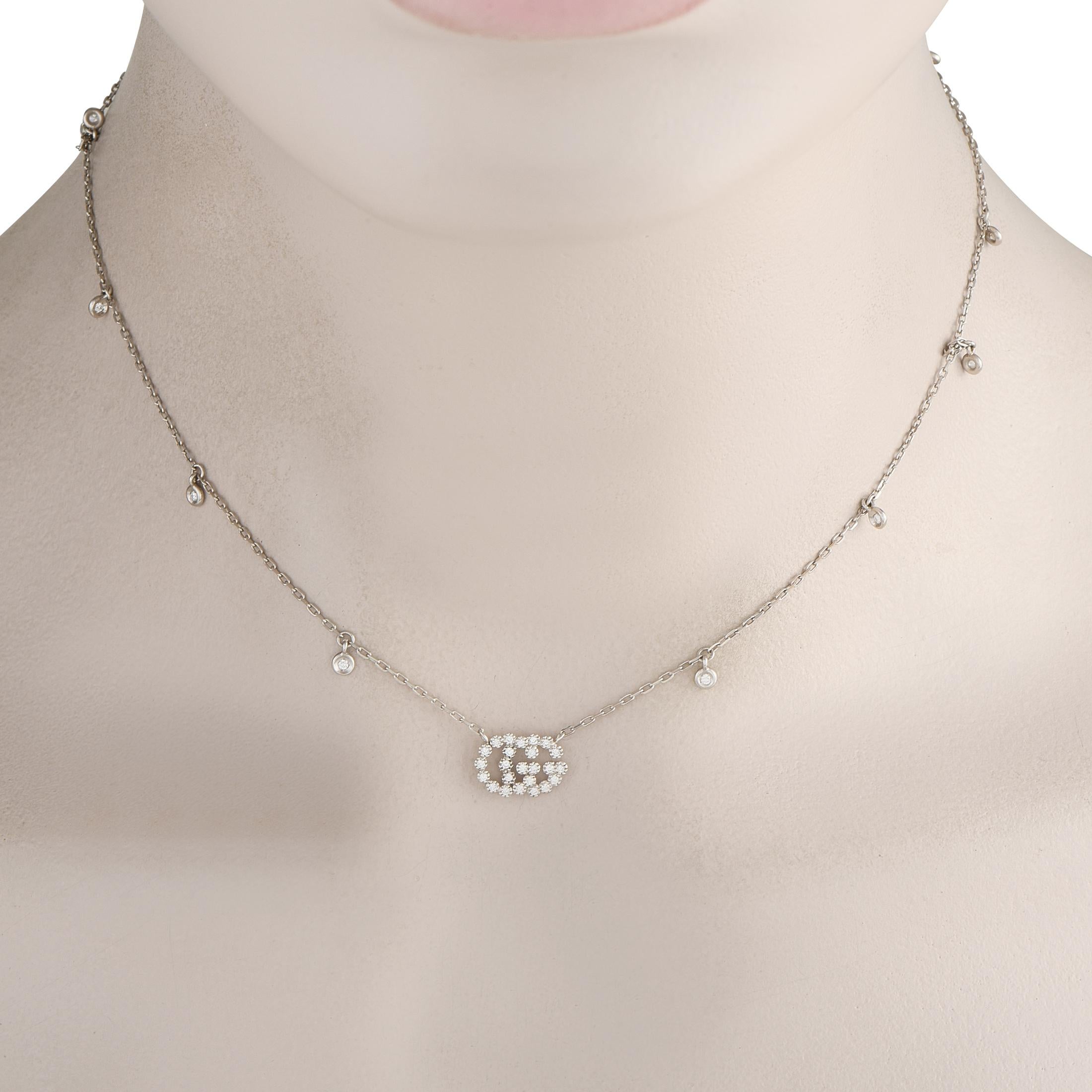 This simple, elegant 18K White Gold Gucci necklace will add a touch of luxury to any ensemble. A central pendant measuring 0.38 long by 0.48 wide features the luxury brands signature Double G logo. Diamonds with a total weight of 0.35 carats add