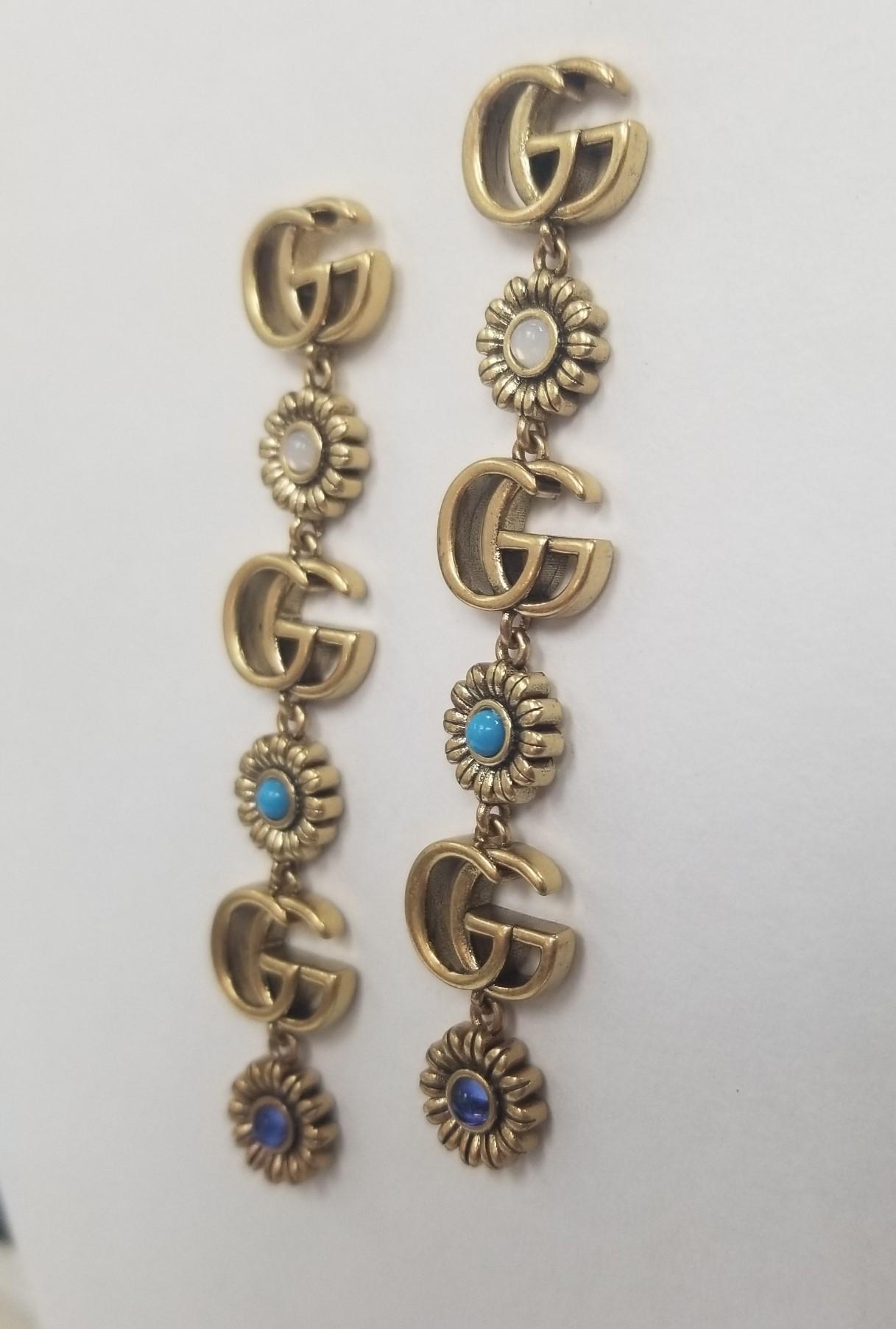 Gucci - The floral interlocked GG Bracelet on Gucci's Bracelet nods to love knots that have been used in jewelry since the ancient Egyptians as a symbol of everlasting love. It's crafted in Italy from antiqued metals.

*we have the matching