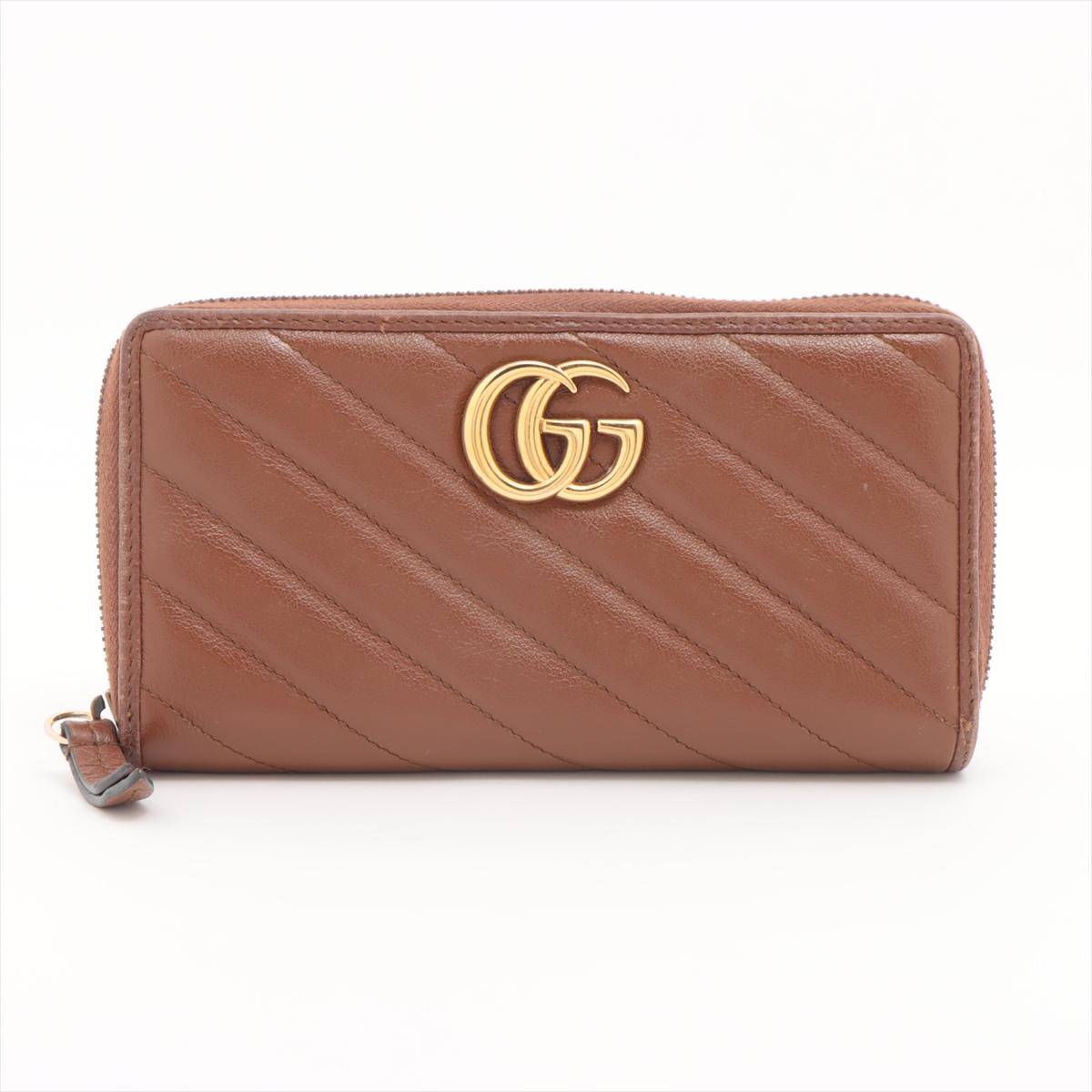 *ships about 12/11

The Gucci Double G Zippy Wallet in Brown is a sophisticated and practical accessory that showcases the brand's iconic style. Crafted from premium leather, it features the signature Double G logo in antique gold-tone hardware,