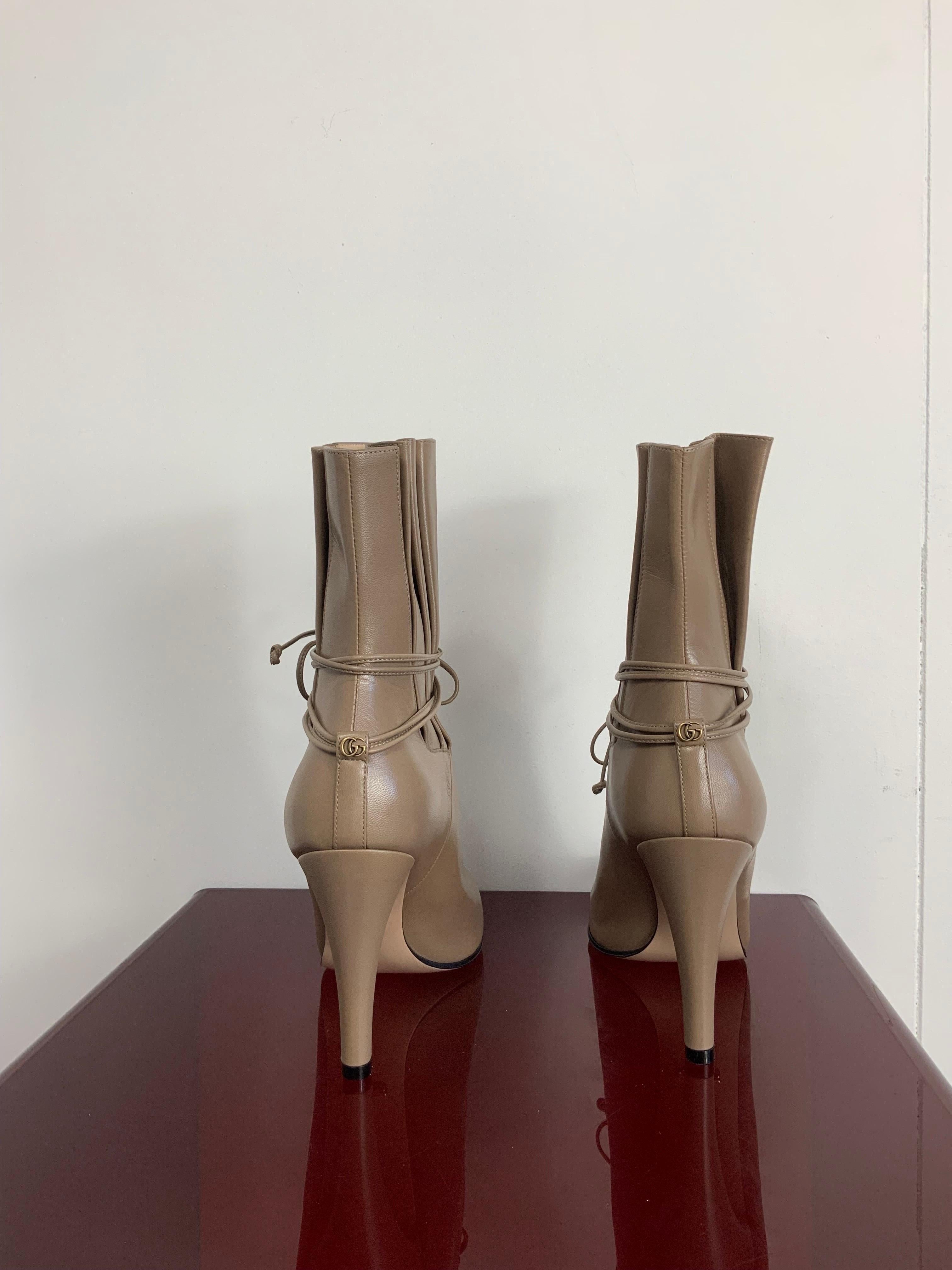 Brown Gucci dove-grey high heels boots