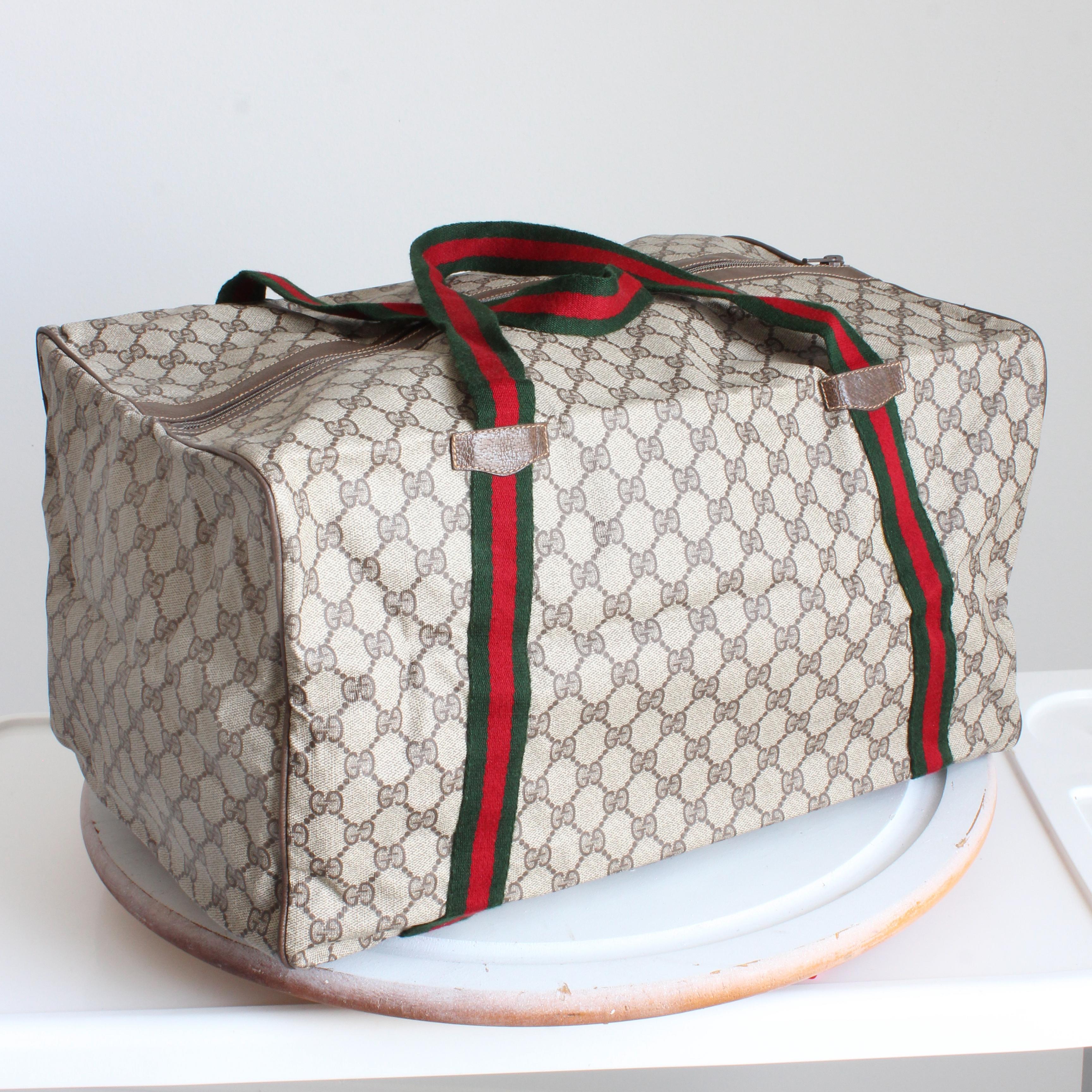 Gucci Duffle Bag GG Logo Canvas Brown Leather Trim Folding Travel Carry On 80s In Good Condition For Sale In Port Saint Lucie, FL