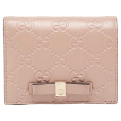 Gucci Guccissima Kartenetui aus rosa Guccissima-Leder mit Schleife