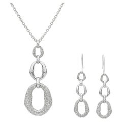 Boucles d'oreilles et collier Gucci 50 grammes or blanc 18k