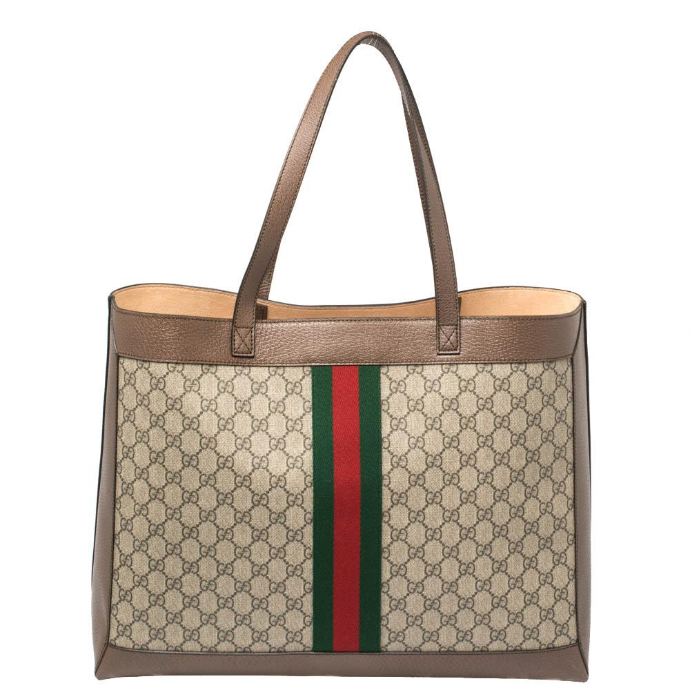 Displaying Gucci's impeccable craftsmanship, this Ophidia tote is stylish, iconic, and versatile—an investment-worthy piece. Crafted from GG supreme canvas & leather, it features the GG logo and web detailing on the front that adds the right amount