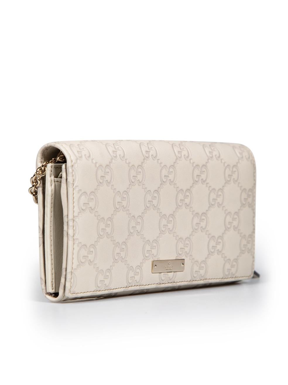 CONDITION is Never worn. No visible wear to bag is evident on this new Gucci designer resale item.
 
 
 
 Details
 
 
 Ecru
 
 Leather
 
 Mini wallet on chain
 
 Guccissima pattern
 
 1x Detachable chain strap
 
 Front metal logo plaque
 
 Flap with
