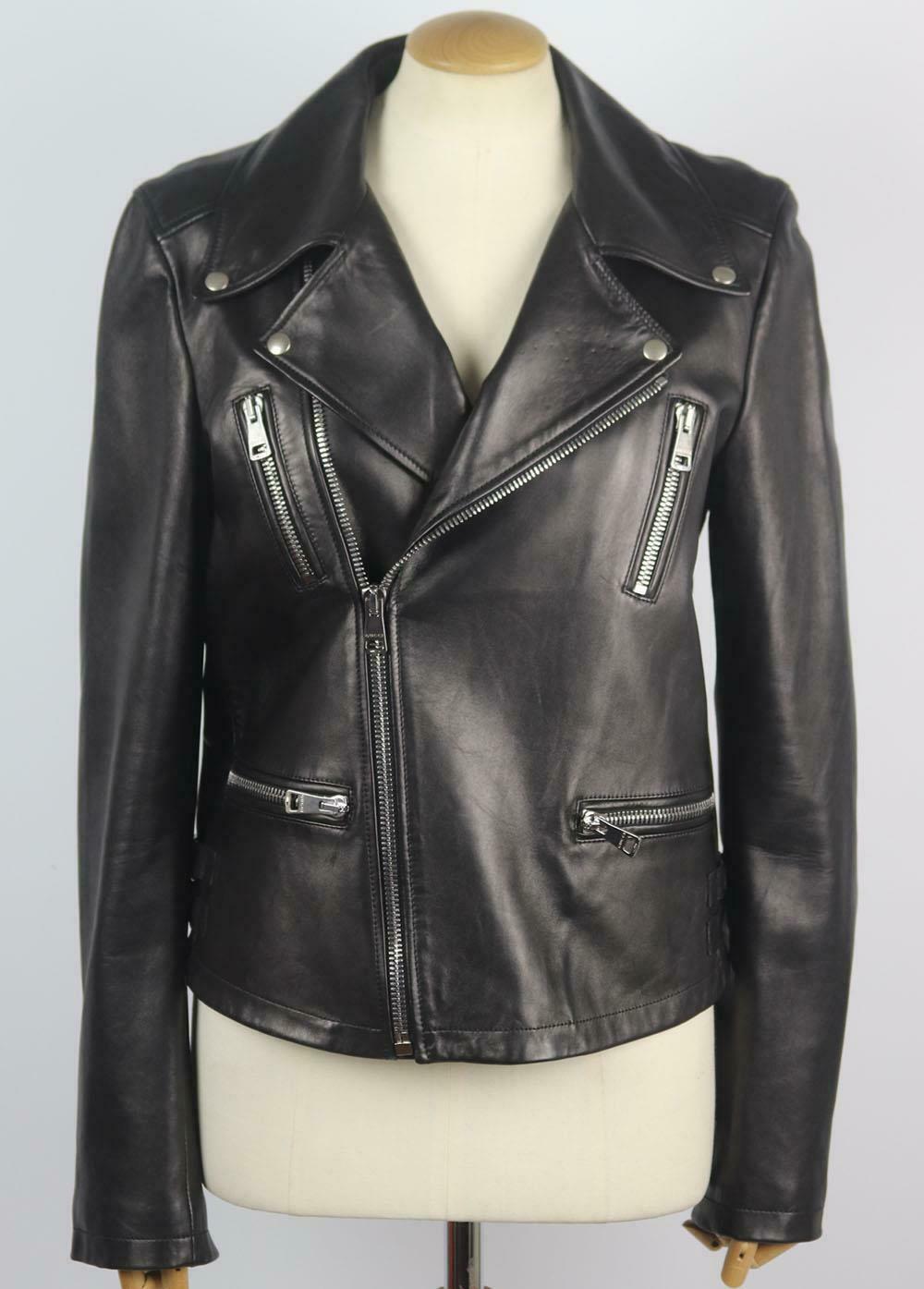 Gucci's leather biker jacket has a cool, customized look, the crystal and beaded embellished 'roaring tiger'  at the back is intricately designed by hand and finished with 'LOVED' patch underneath - each piece takes an artisan hours to complete.