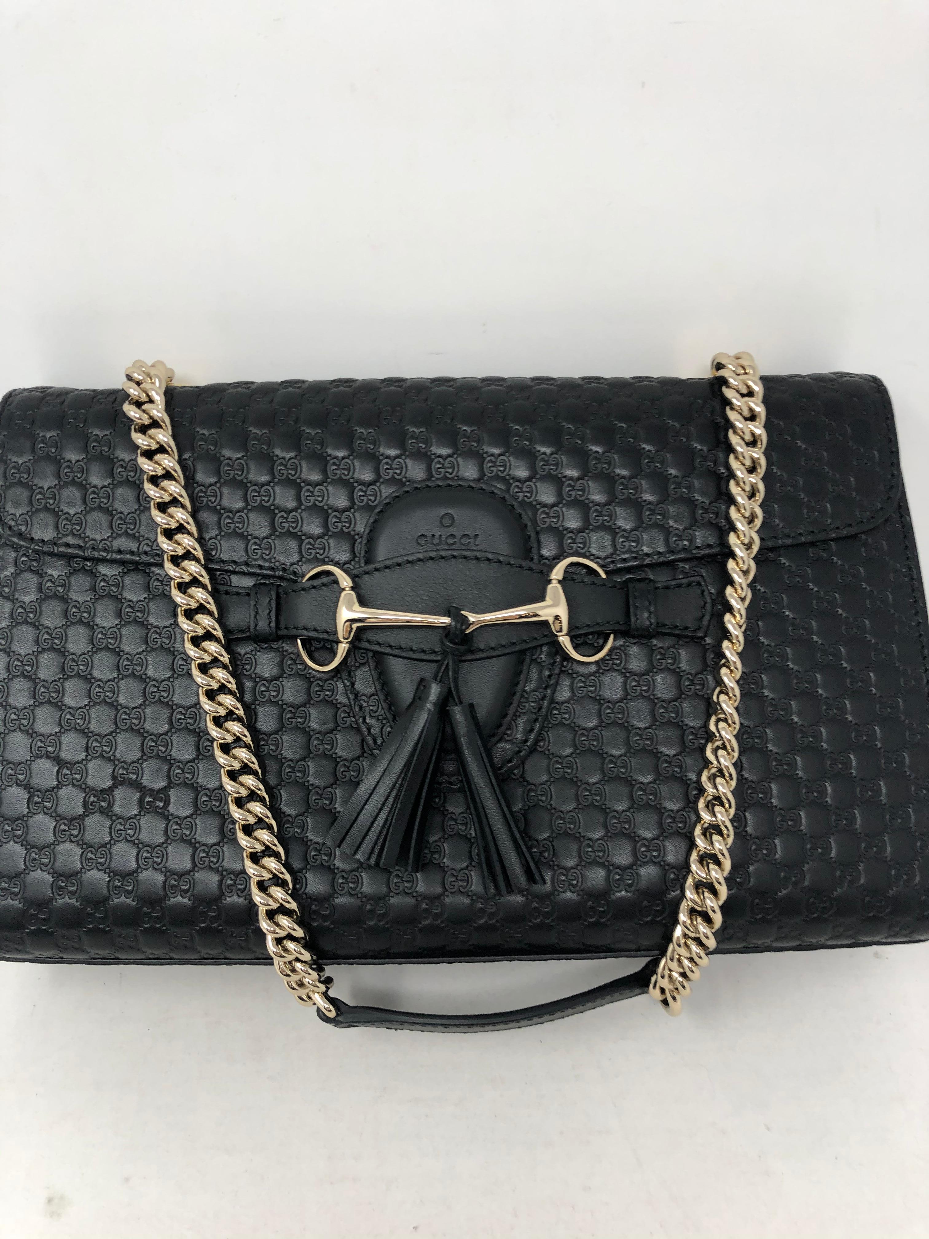 Gucci Embossed Monogram Black Leather Clutch/ shoulder bag. Beautiful black leather. New conditon. Never used. Gold hardware. Strap can be worn as a shoulder bag. Gold horsebit closure. Classy bag. Limited and rare style. Guaranteed authentic. 