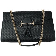 Used Gucci Embossed Black Leather Bag