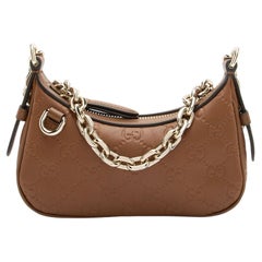 Gucci Embossed GG Leather Emblem Mini Chain Shoulder Bag