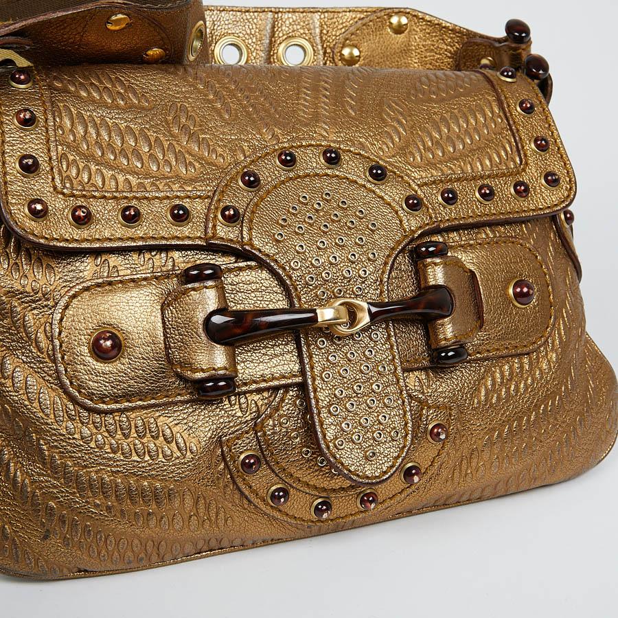 gold leather handbag