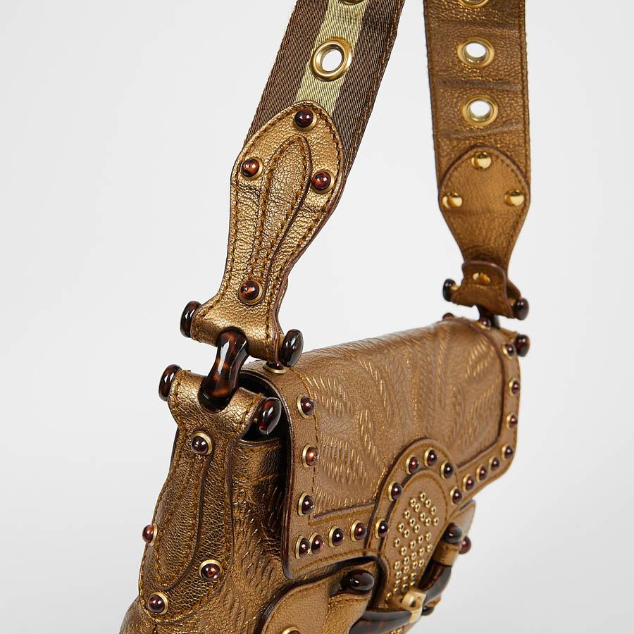 Women's GUCCI Embossed Gold Leather Vintage Handbag 