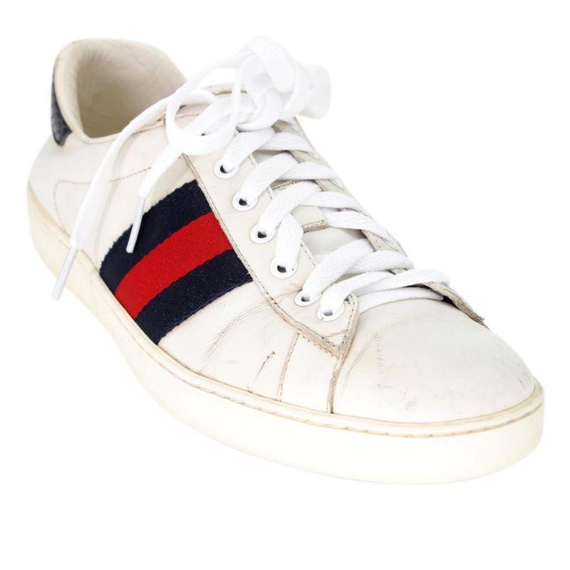 Gucci Embroidered 7.5 Calfskin Leather Low-top Ace Sneakers GG-0505N-0166

These stylish sneakers are crafted of leather and embellished with the iconic Gucci Bee green and red web canvas red and green snakeskin at the heels. These are fabulous