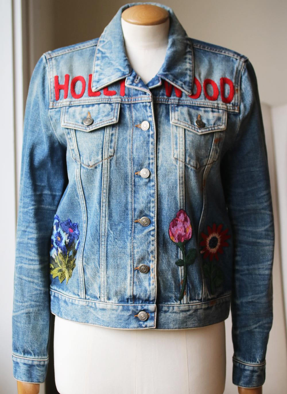 This denim jacket is embroidered with a rabbit, floral motifs and the word 'Hollywood' across the chest. 
Light-blue denim. 
Button fastenings through front. 
100% Cotton. 
Made in Italy. 

Size: IT 40 (UK 8, US 4, FR 36)

Condition: As new