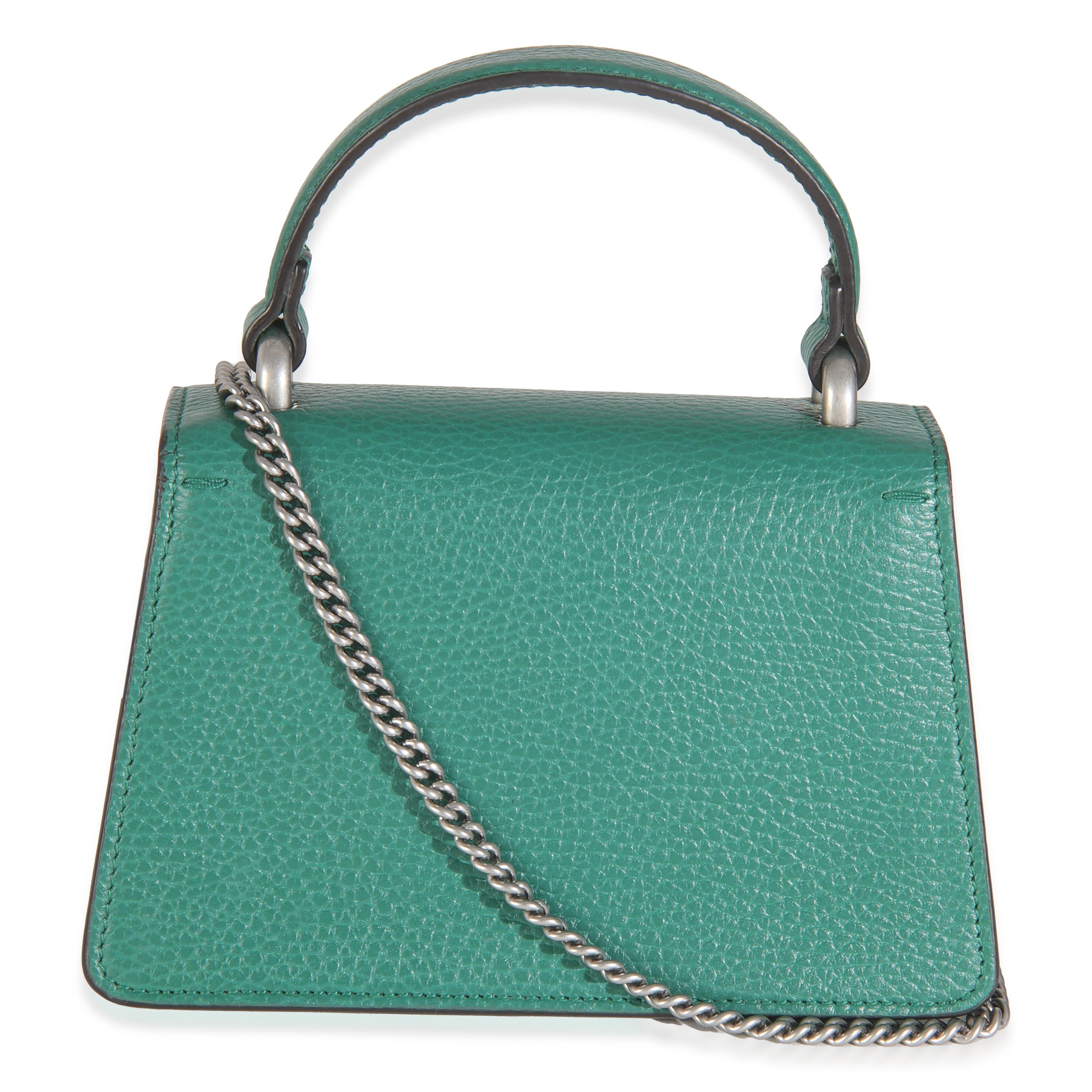 Auflistung Titel: Gucci Emerald Dollar Kalbsleder Crystal Mini Dionysus Top Handle Bag
SKU: 145563
MSRP: 1980.00 USD
Zustand: Gebraucht 
Beschreibung des Zustands: Die Dionysus Crossbody Bag von Gucci, die 2015 die Modewelt im Sturm eroberte, wurde