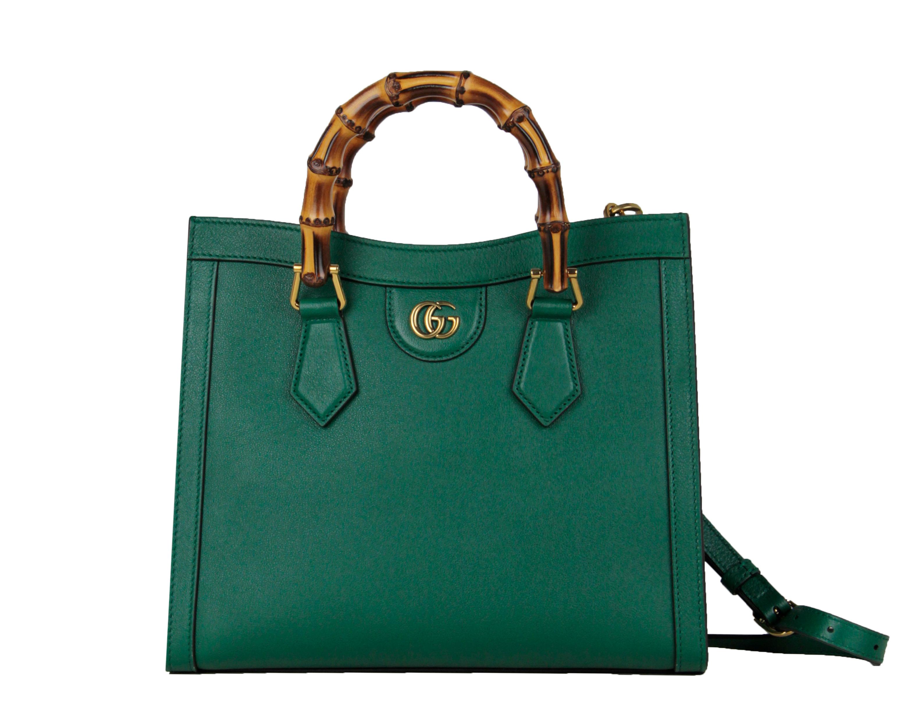 Gucci Emerald Green Small Calfskin Leather Diana Bamboo Bag w/ Strap 660195 43075

Made In: Italy
Year of Production: 2021
Color: Emerald green
Hardware: Goldtone
Materials: Calfskin leather
Lining: Microfiber lining with a suede-like