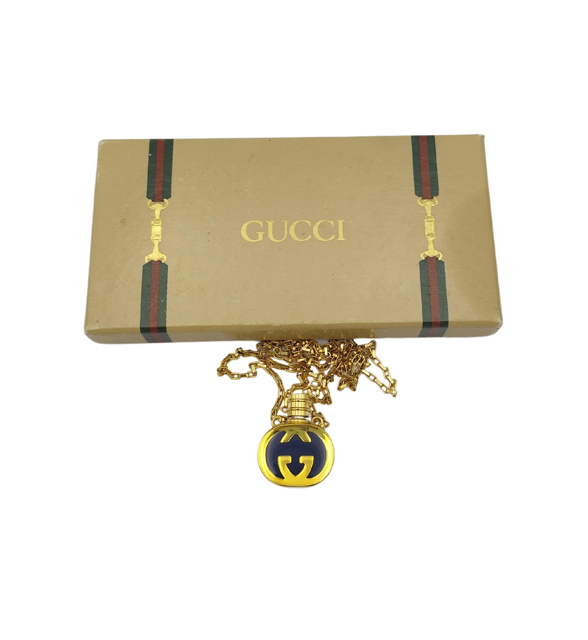 Brown Gucci enameled logo perfume bottle necklace