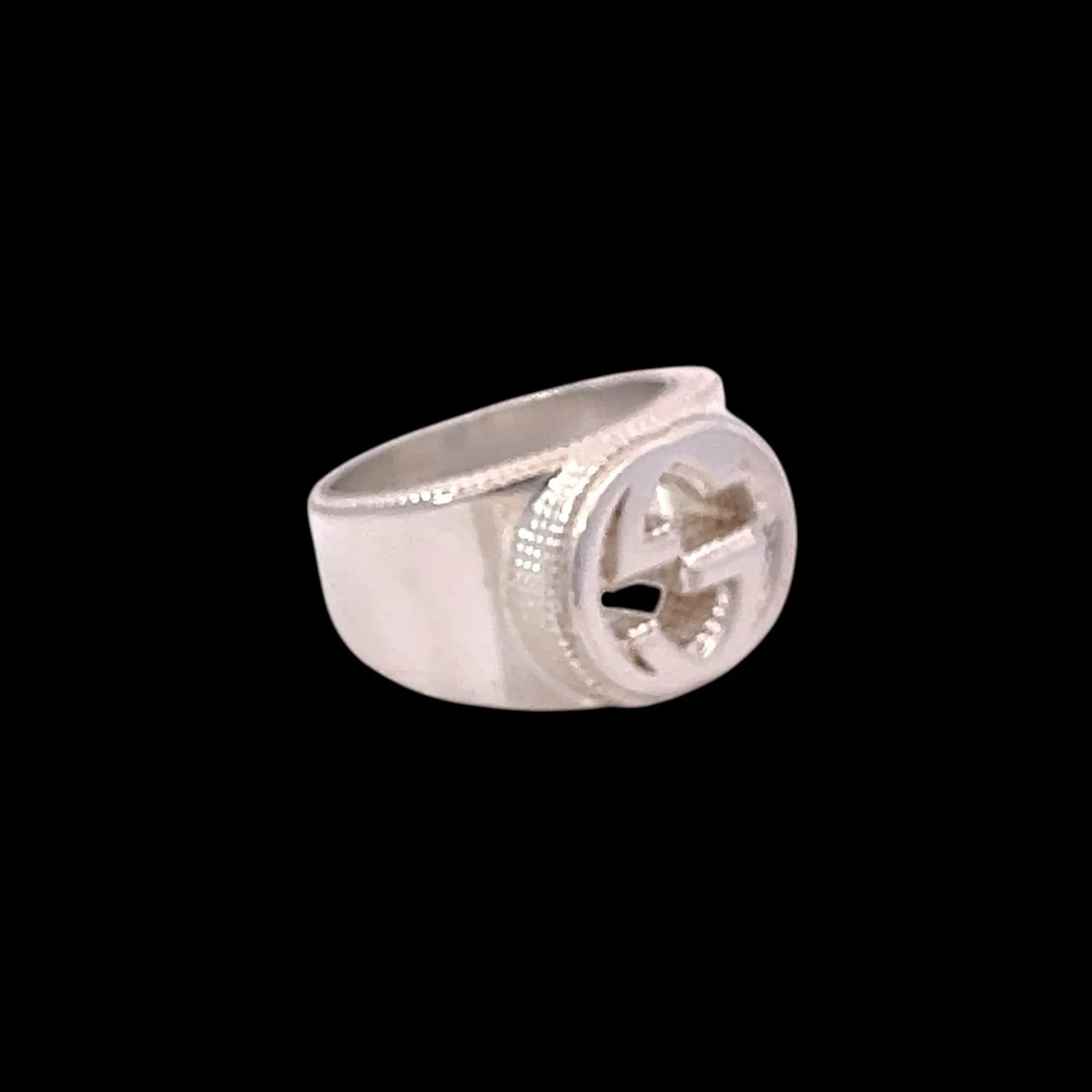 Authentic Gucci Estate Sterling Silver Ring Size 8.5, 15 mm Height 17.9 Grams G45

This elegant Authentic Gucci ring is made of sterling silver and has a weight of 17.9 grams with an 15 mm Height.

TRUSTED SELLER SINCE 2002

PLEASE SEE OUR HUNDREDS