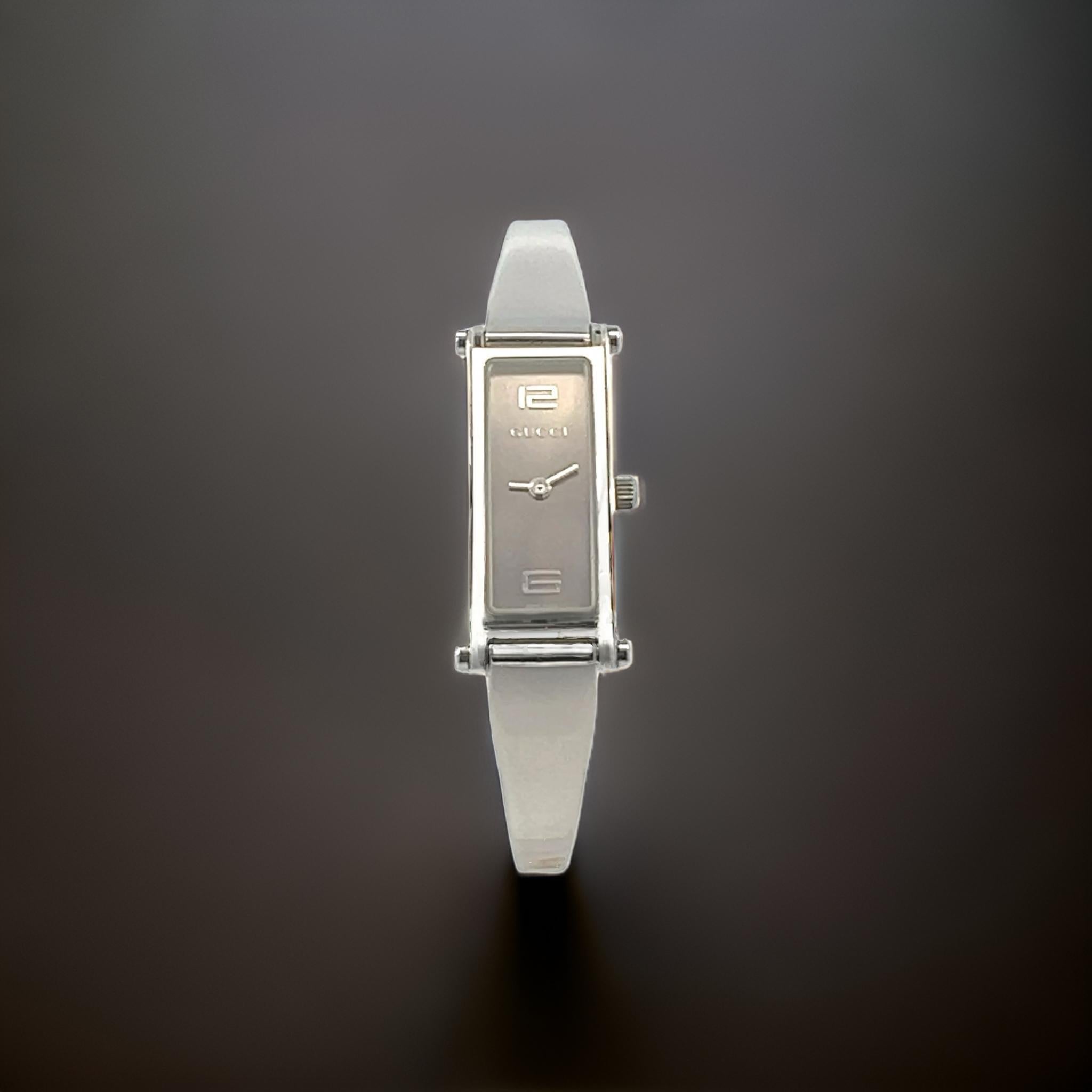 Authentic Gucci Estate Swiss Made Stainless Steel Ladies Wristwatch G42

This iconic Gucci stainless steel ladies wrist watch is a timeless piece of luxury and style.

The sleek design is crafted from polished stainless steel, giving it a